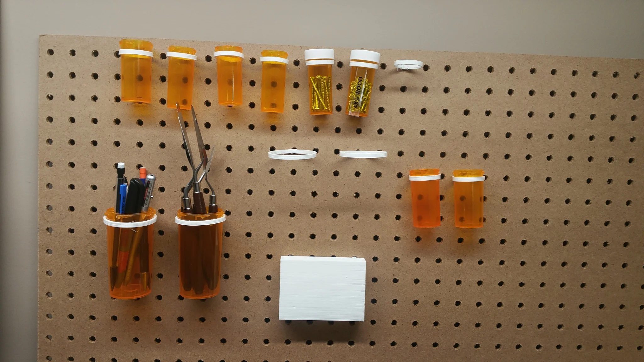 Pill bottle pegboard