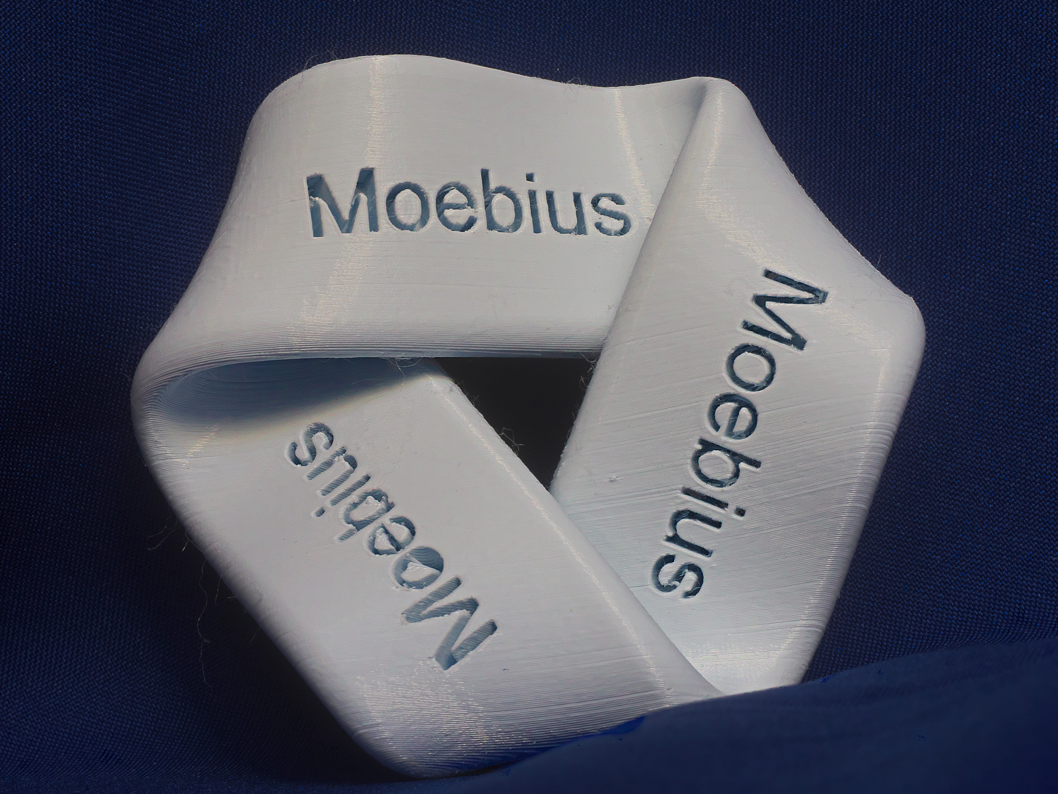 Embossed Moebius strip
