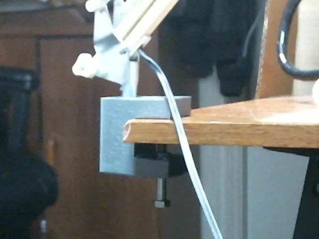 Clamp for desk lamp/magnifier. SCad file and STL