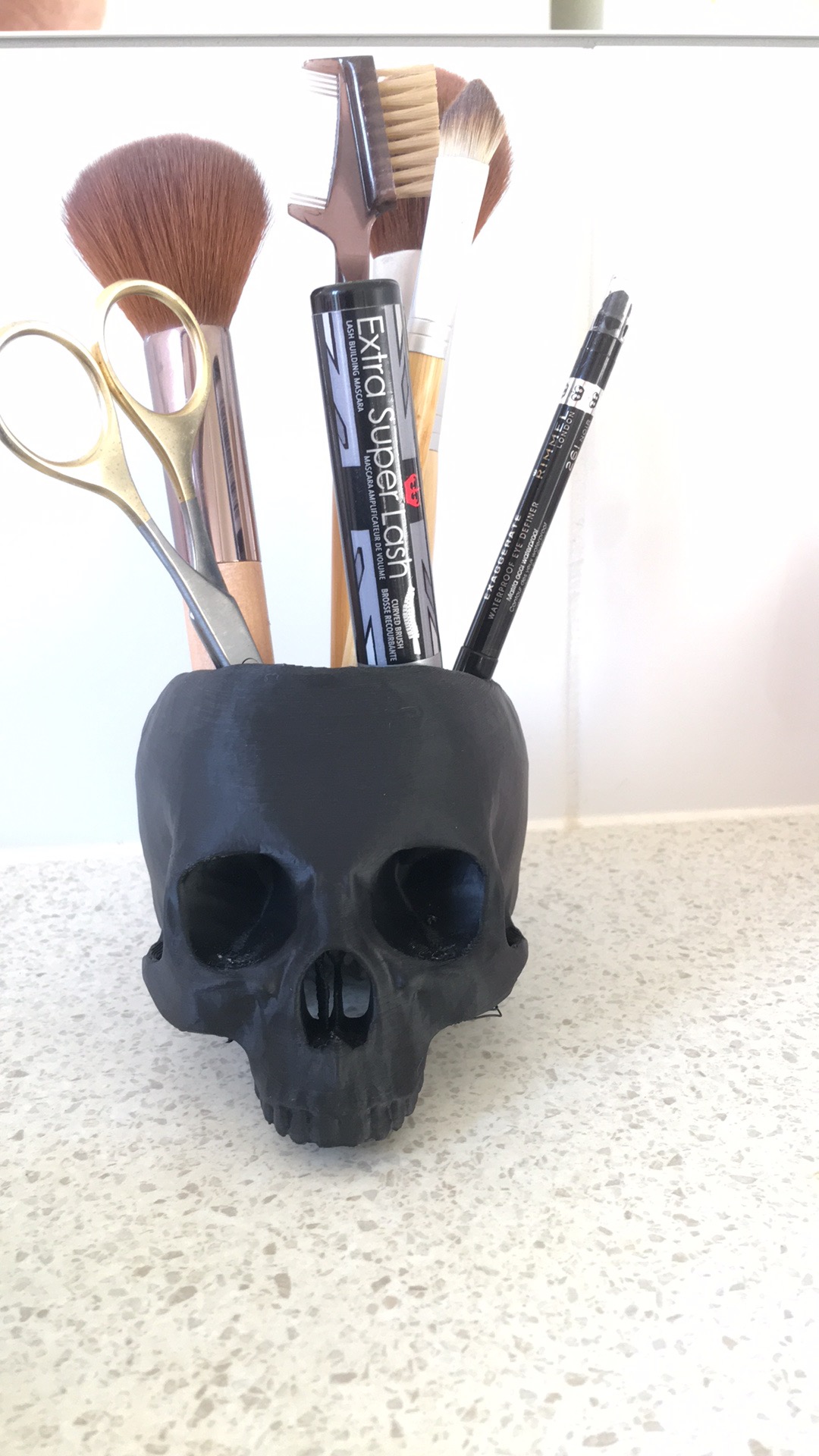 Skull makeup stand