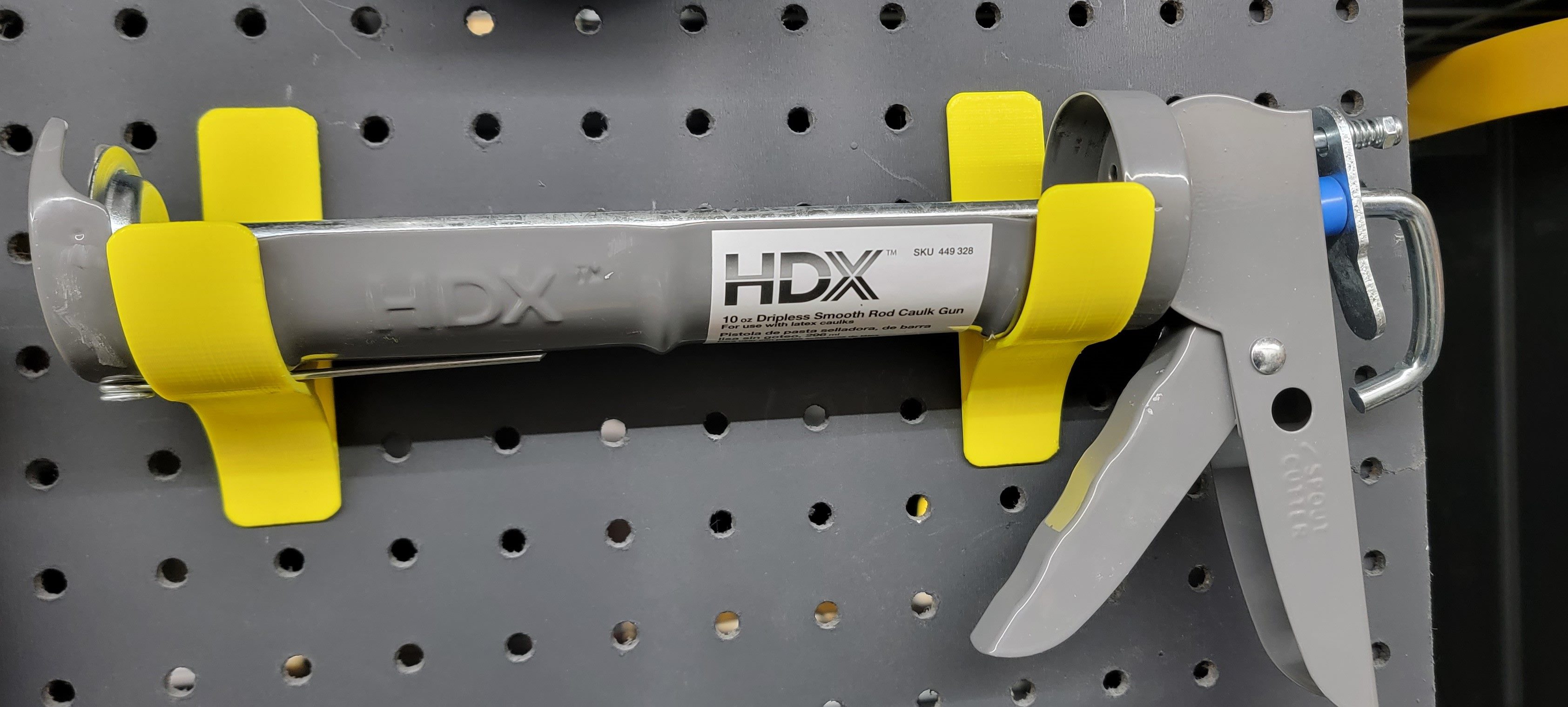 Caulk Gun Pegboard Mount