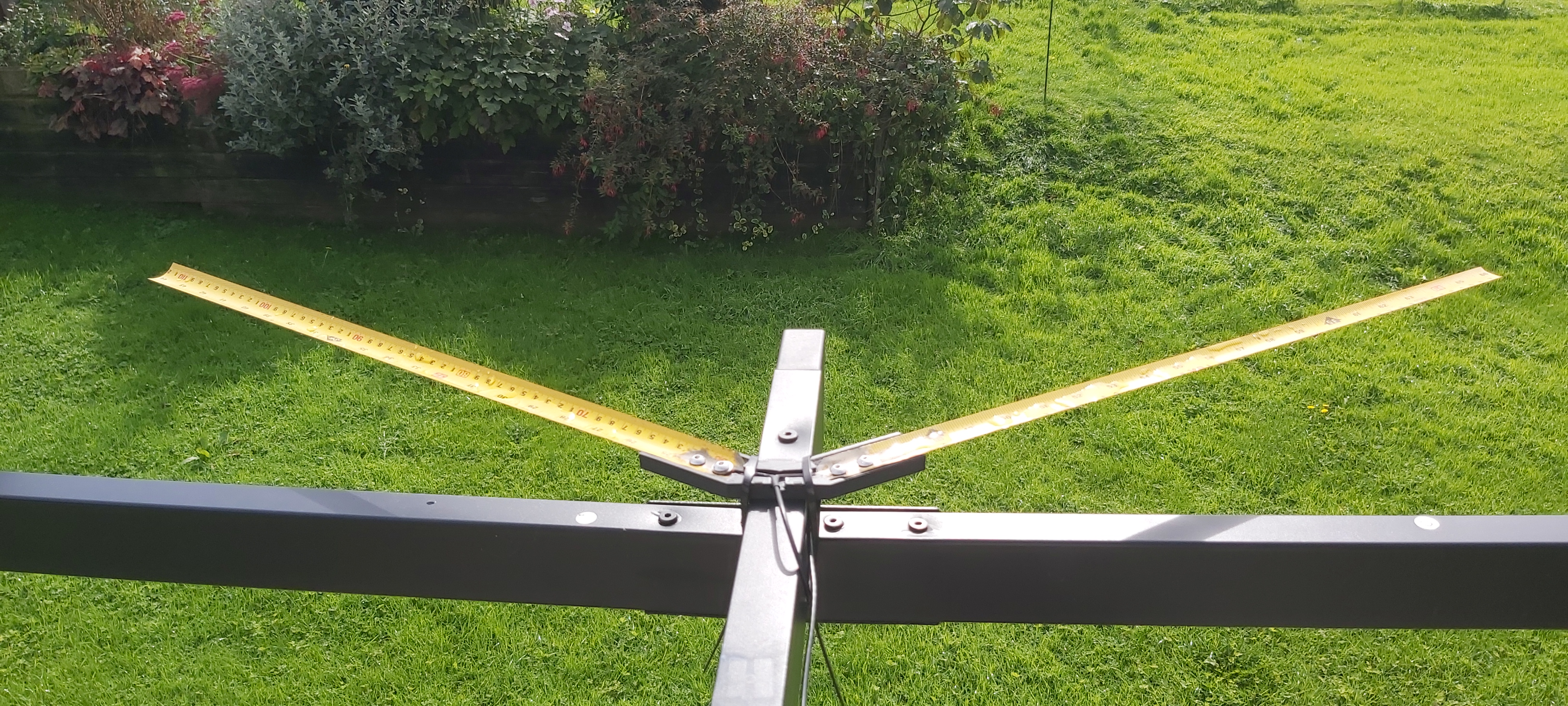 Tape measure antenna base for receiving NOAA satellites