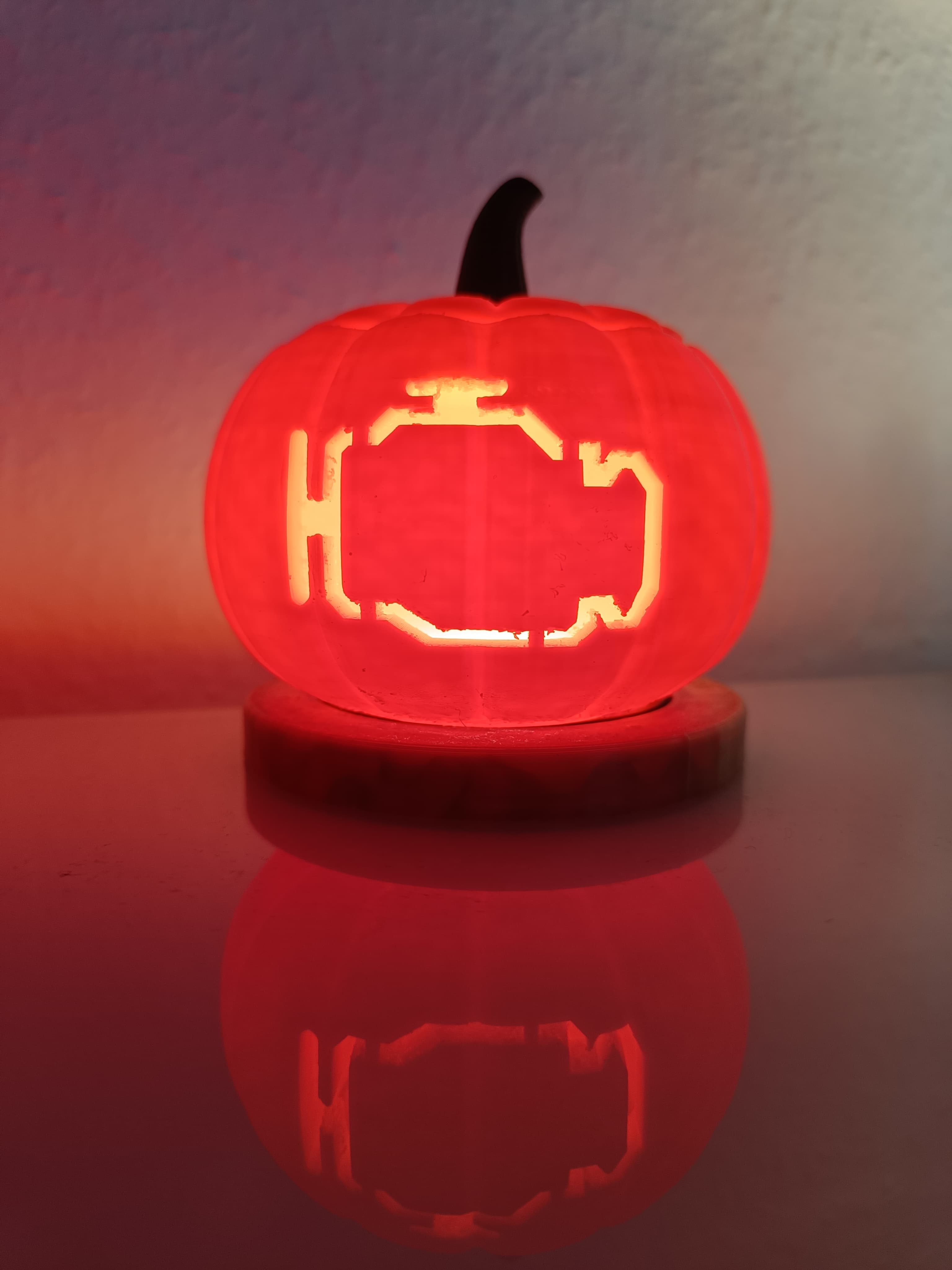 Jack o Latern with "check engine sign"