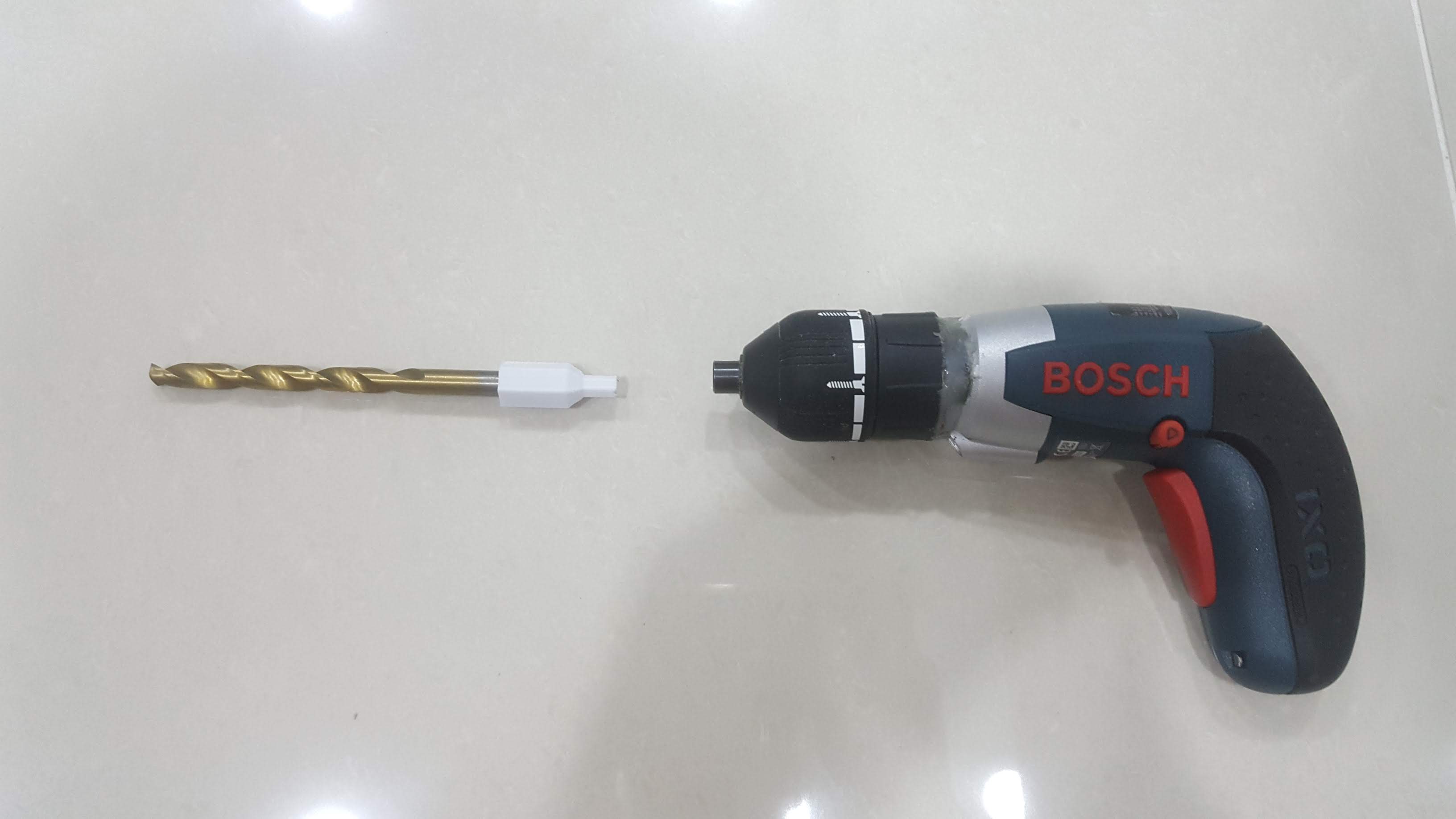 8mm bit to 1/4 inch or 6.35mm bit adaptor (holder)