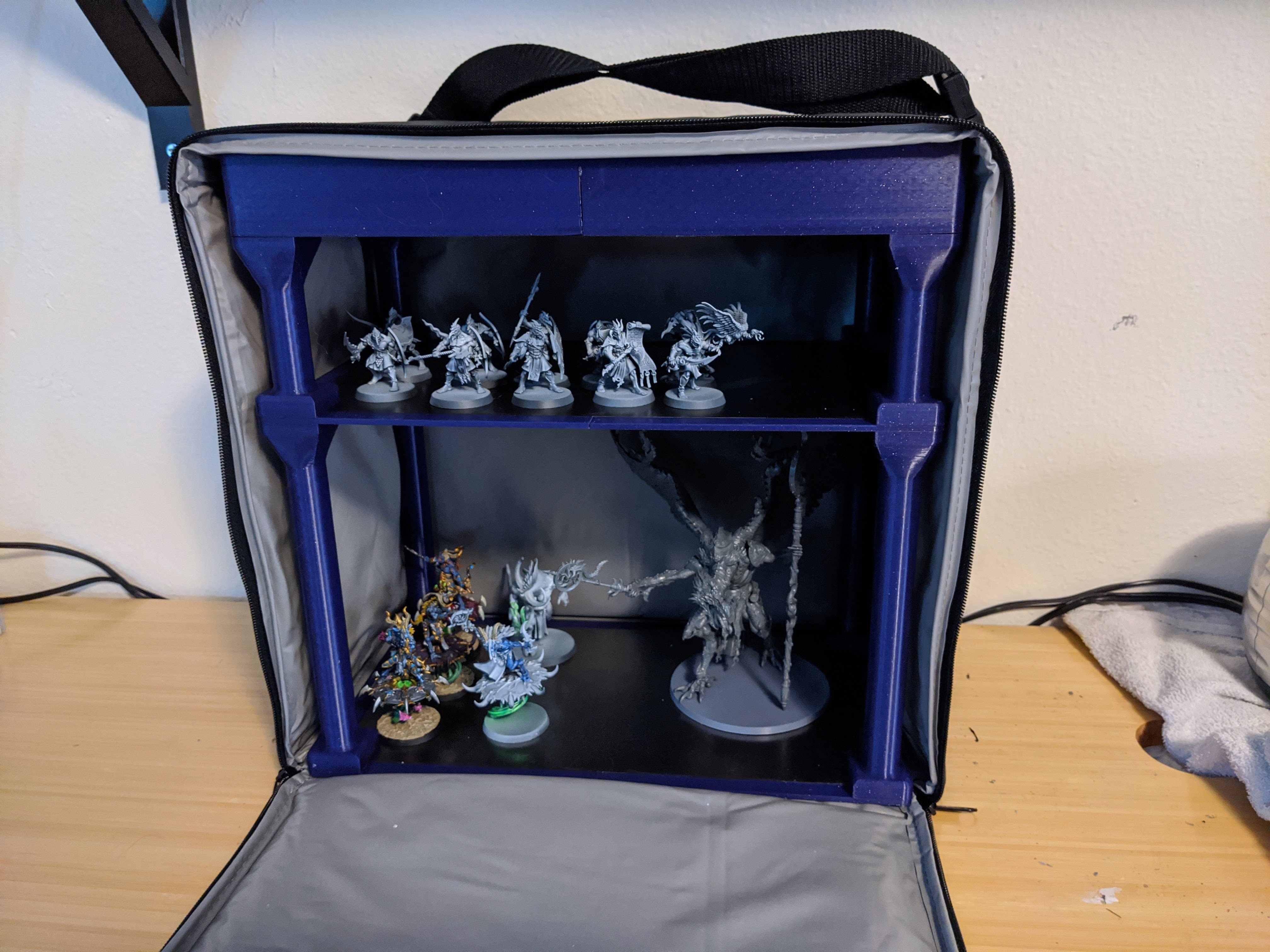 Magnetic storage racks for Army Transport case