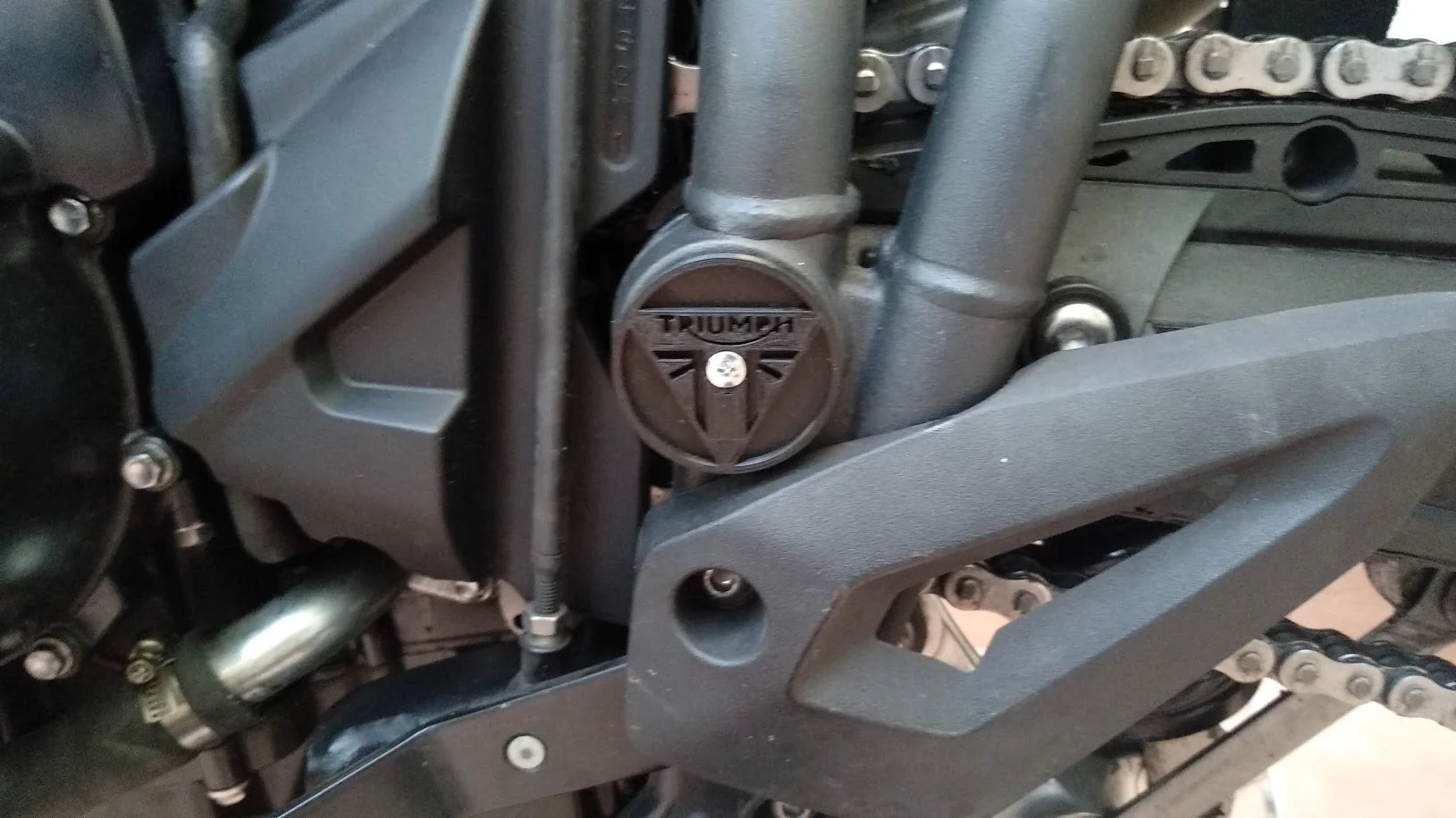 Triumph Tiger 800 Swingarm pivot cover