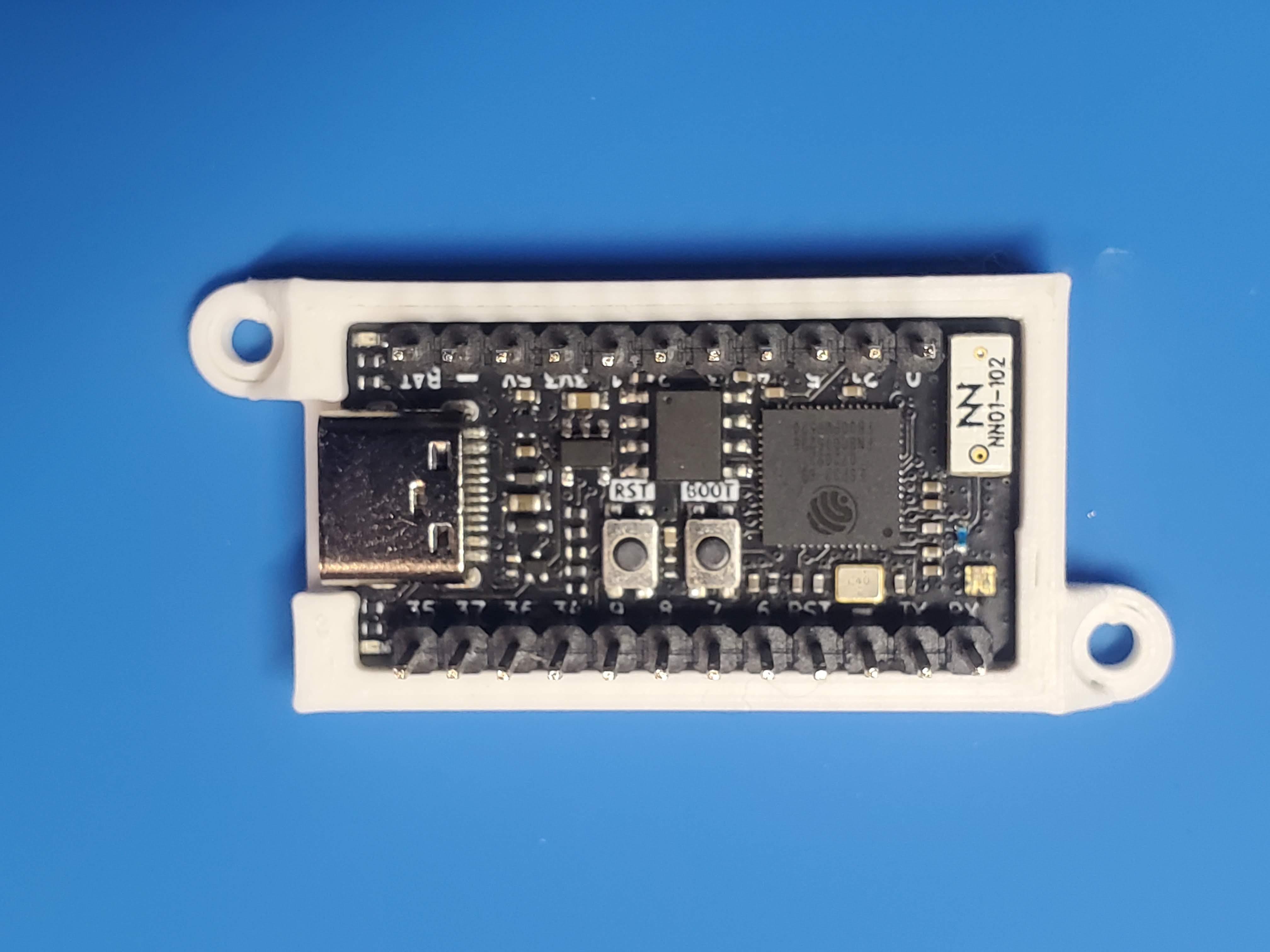Holder for the TinyS3 development board from Unexpected Maker