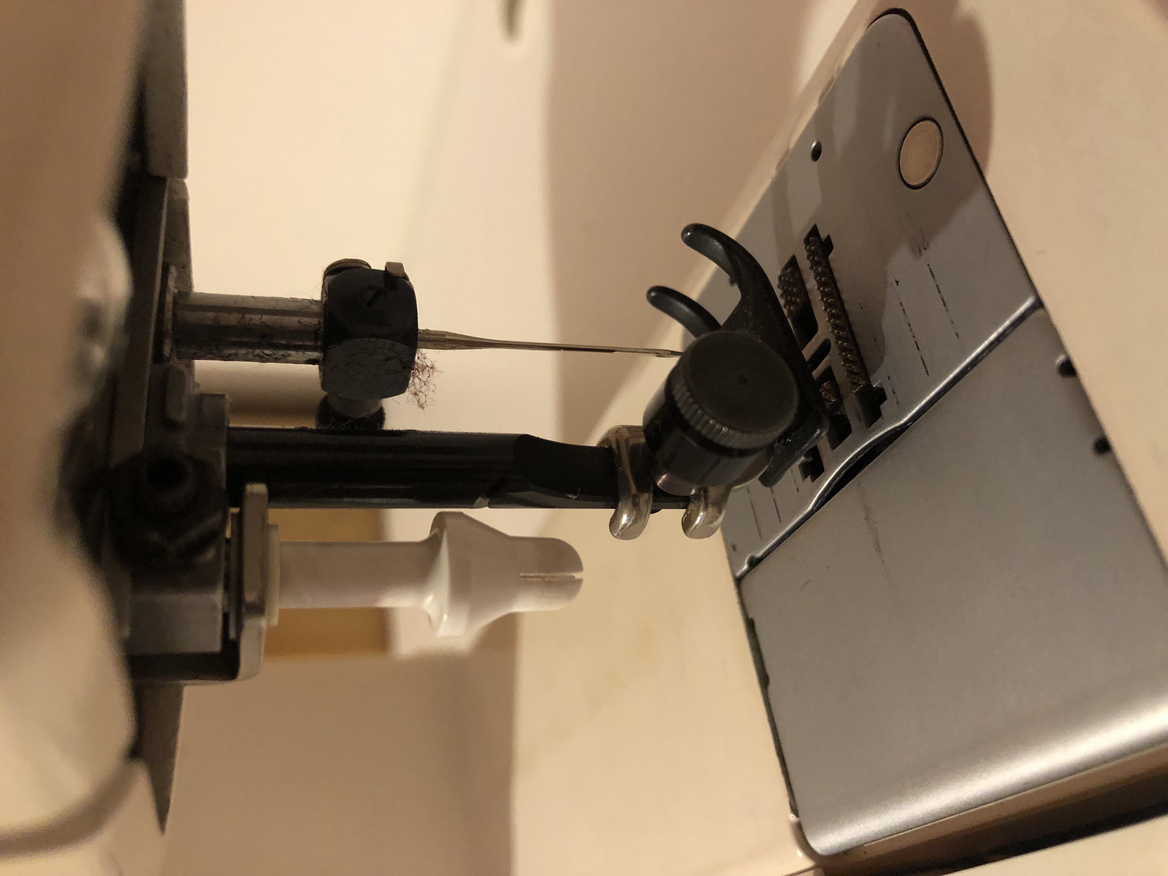 Elna sewing machine bobbin extractor