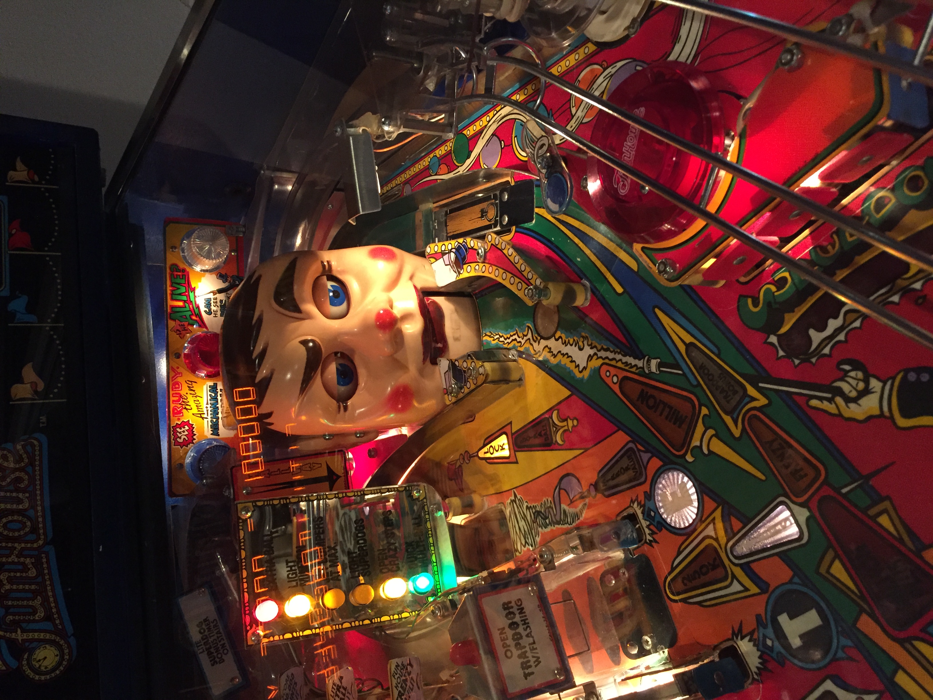 Eyelid latch for Funhouse / Roadshow pinball machine