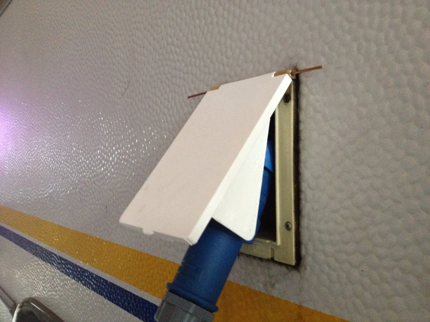 Caravan power connector cover