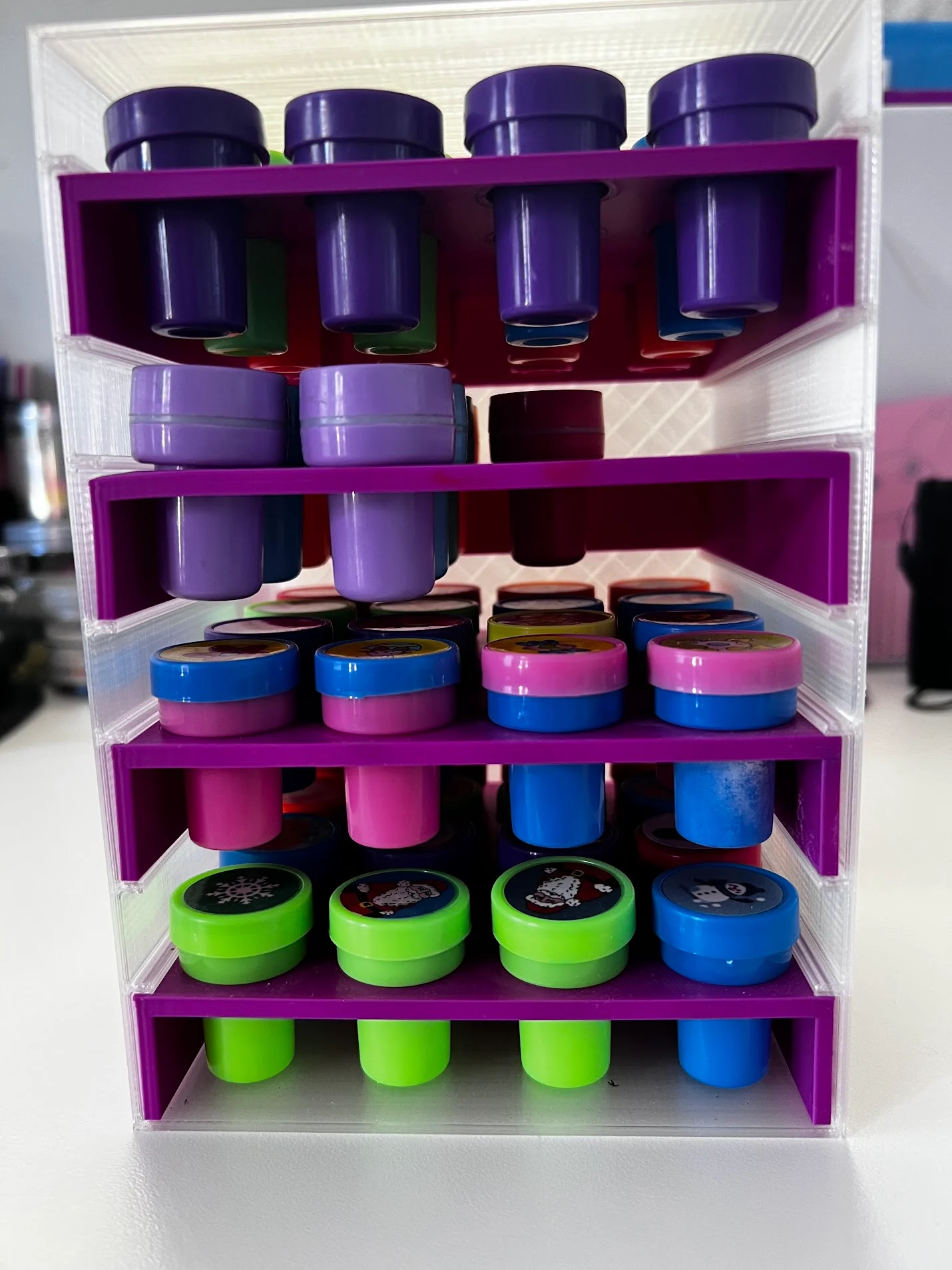 Self inking stamp storage tower