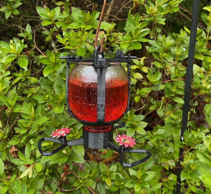 Hummingbird Feeder from an apple juice bottle