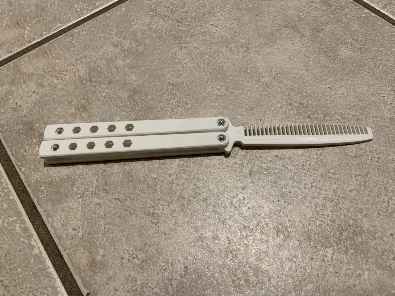 Butterfly Knife Comb