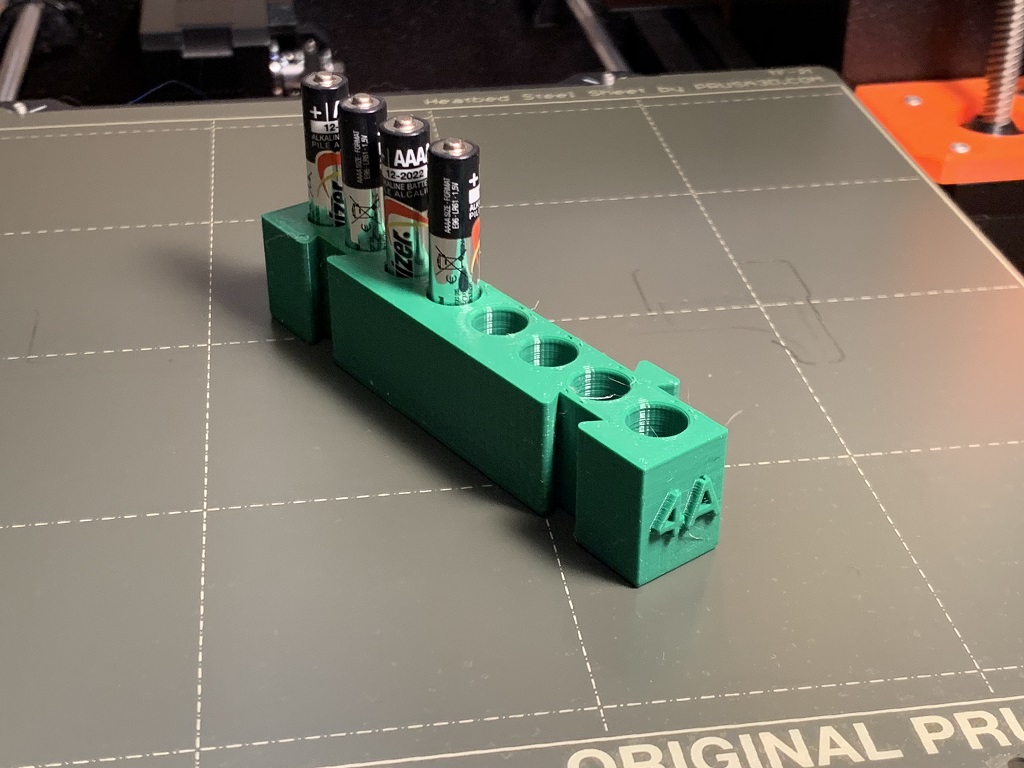 Modular AAAA Battery Holder