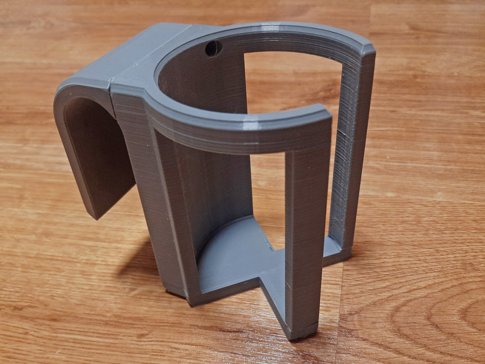 Bottle/mug holder for orthopedic bed