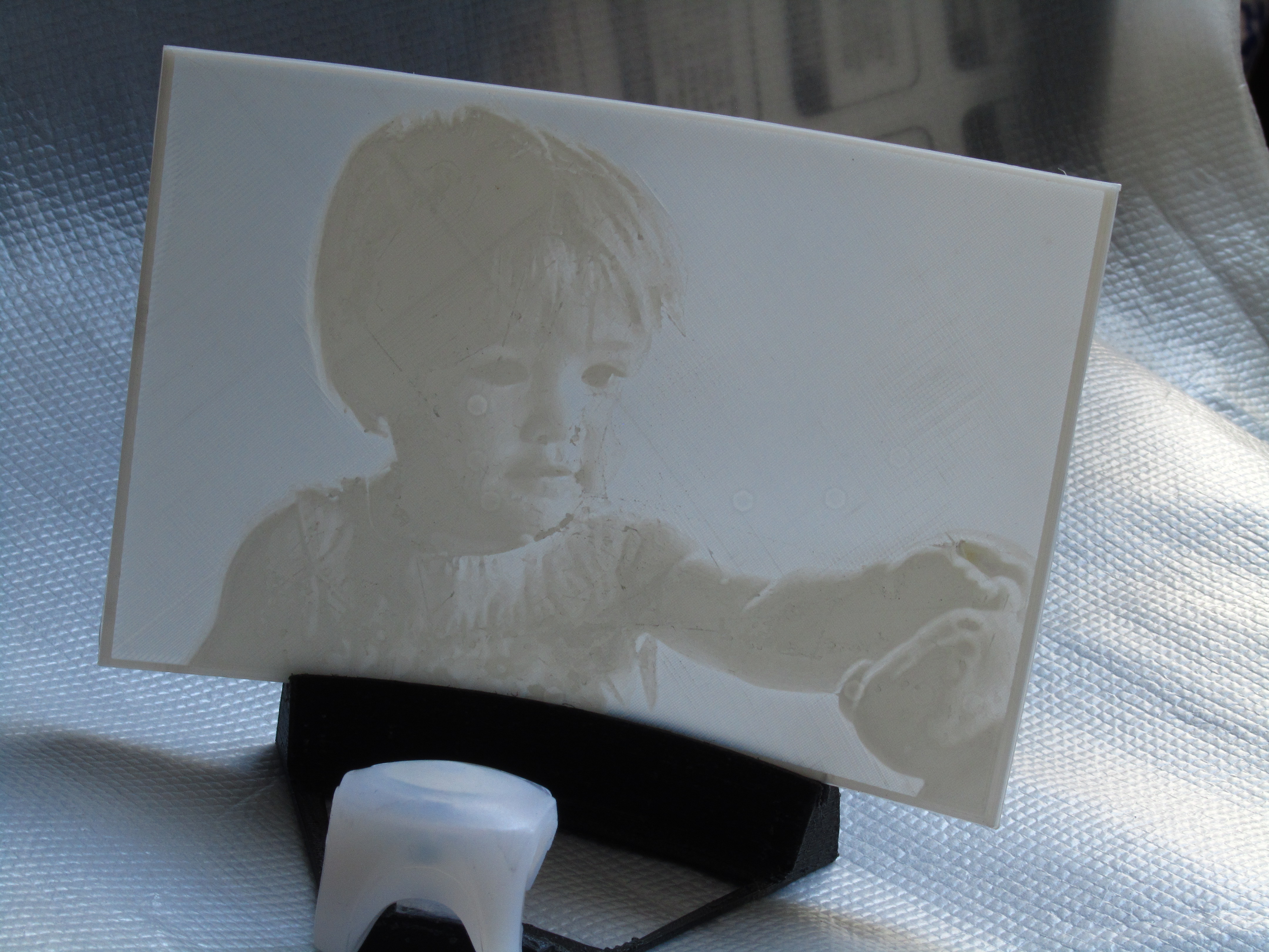 Lithophane support with bike light