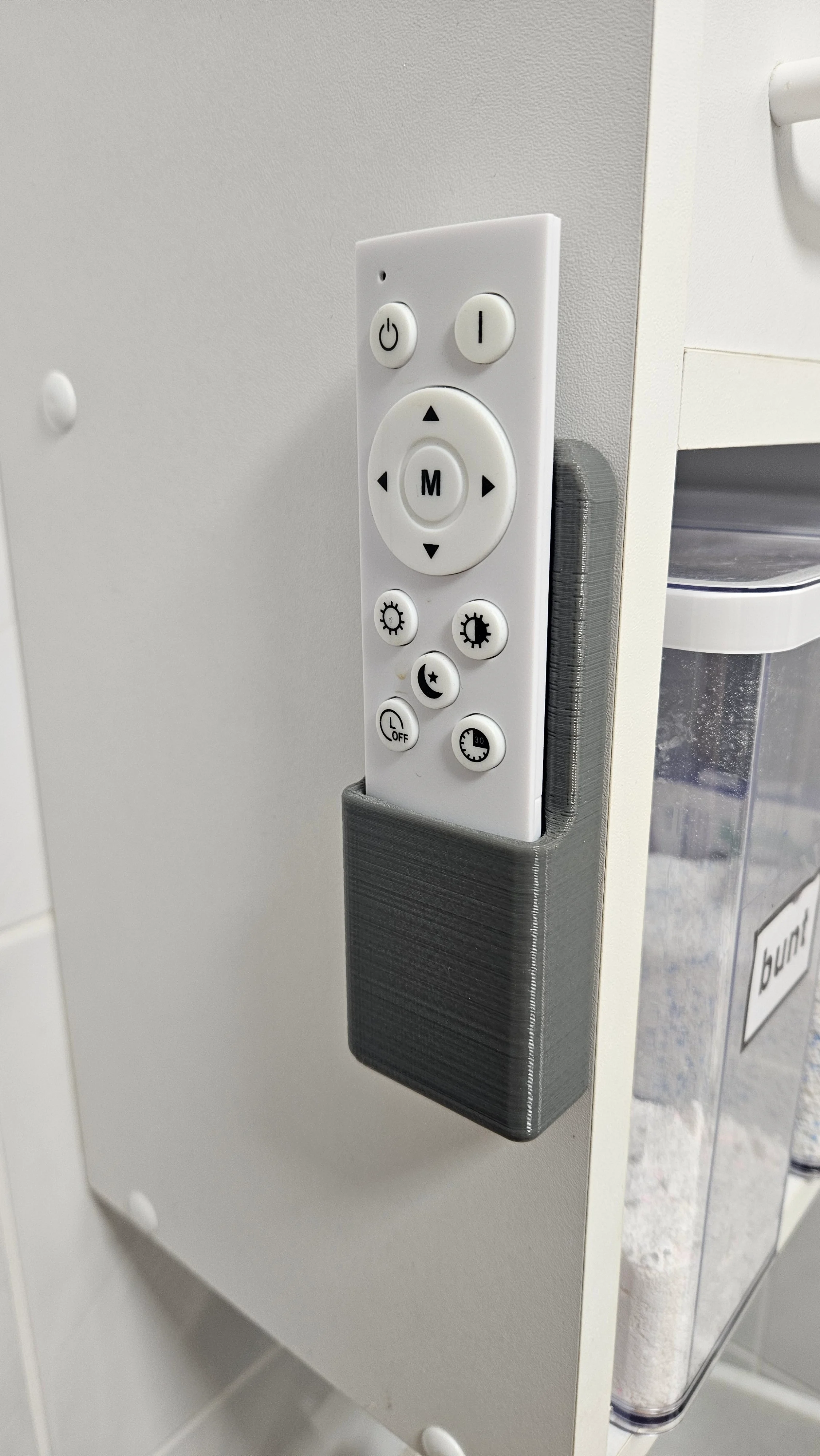 Remote control holder for ceiling lamp