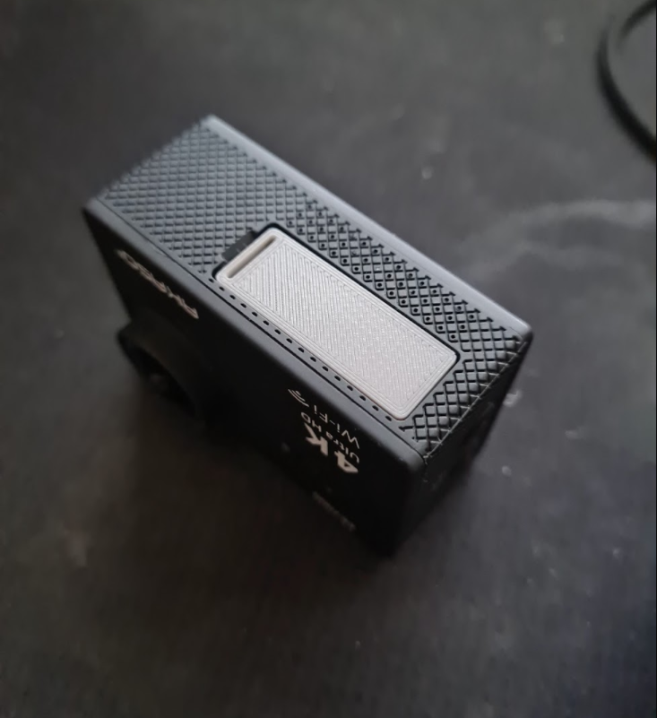 Knockoff GoPro / Action Camera Battery Cover-Flap