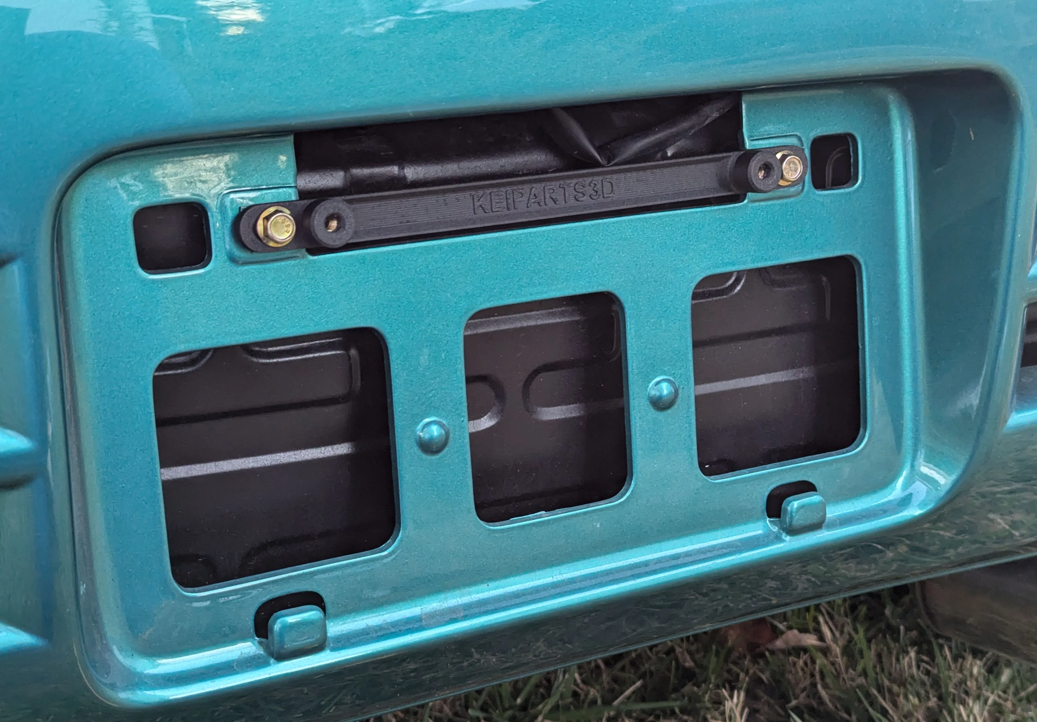 JDM to USDM license plate adapter