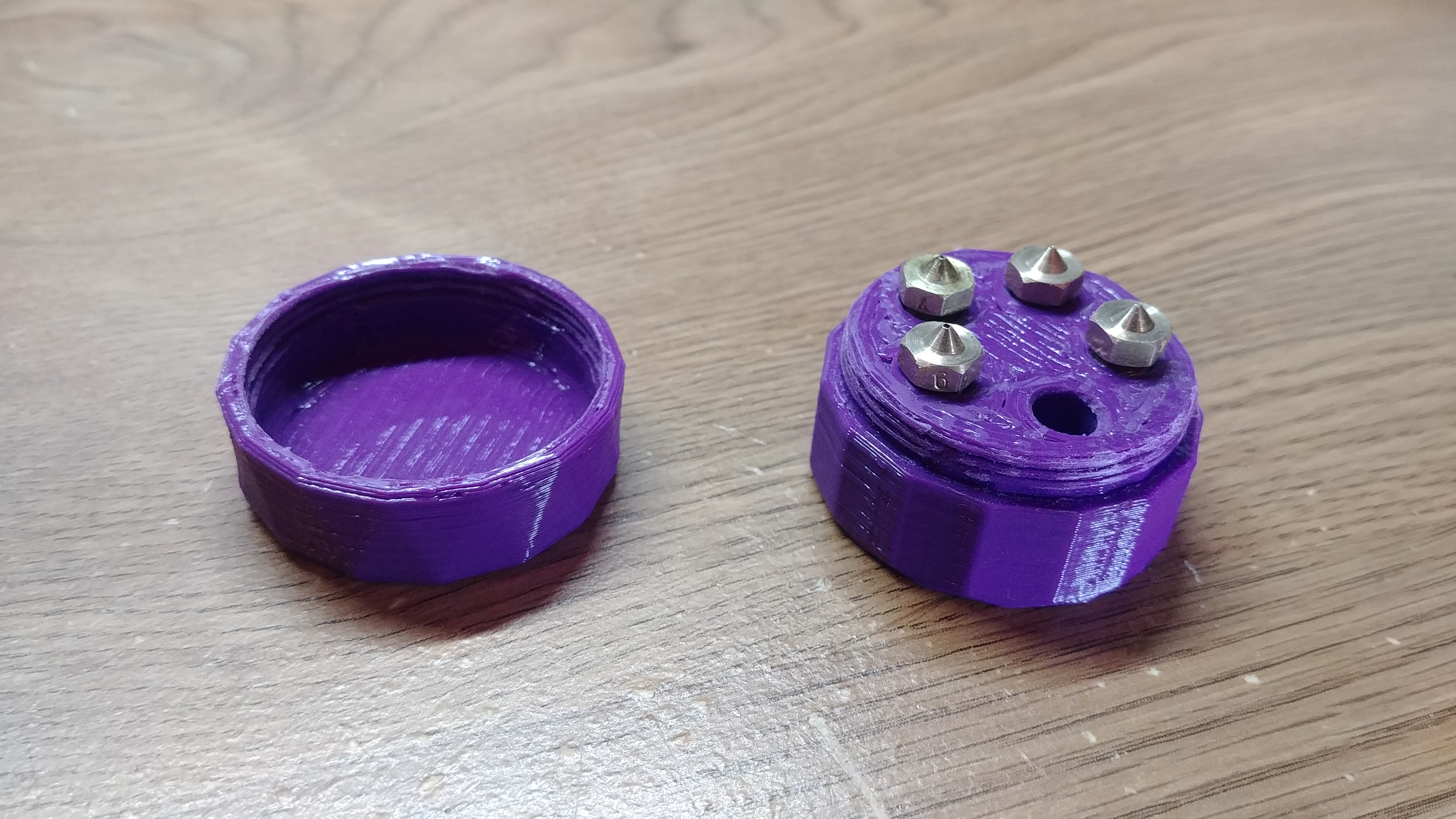 Nozzle Container