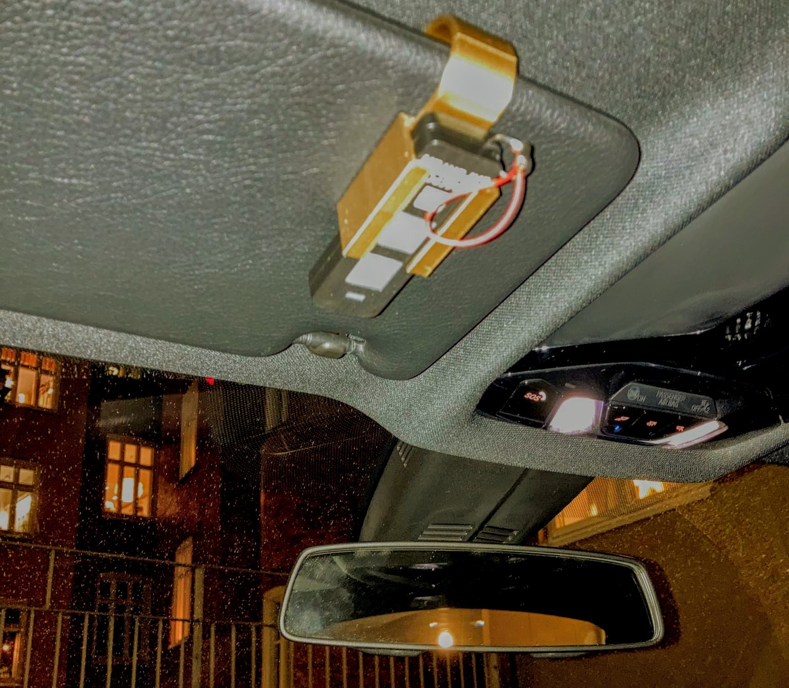 Remote control holder for garage opener