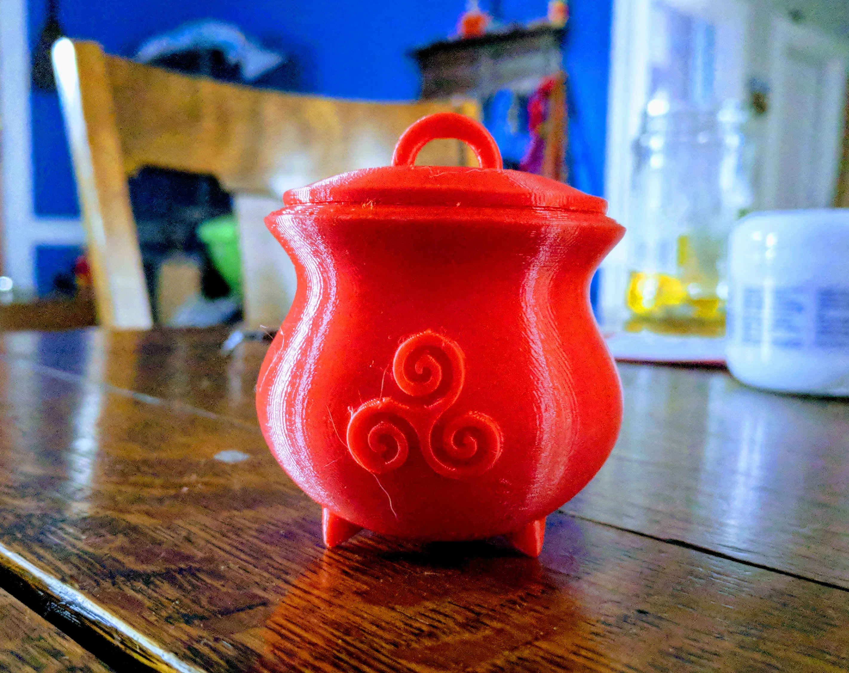 Cauldron with triskelion