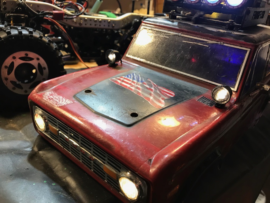 Lights mounting on bonnet