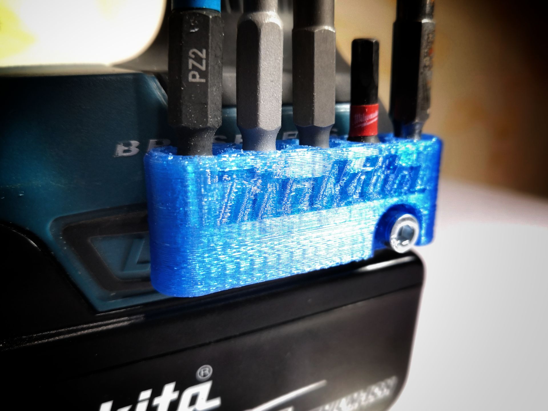 Makita bitmag (drill bits holder with Makita logo)