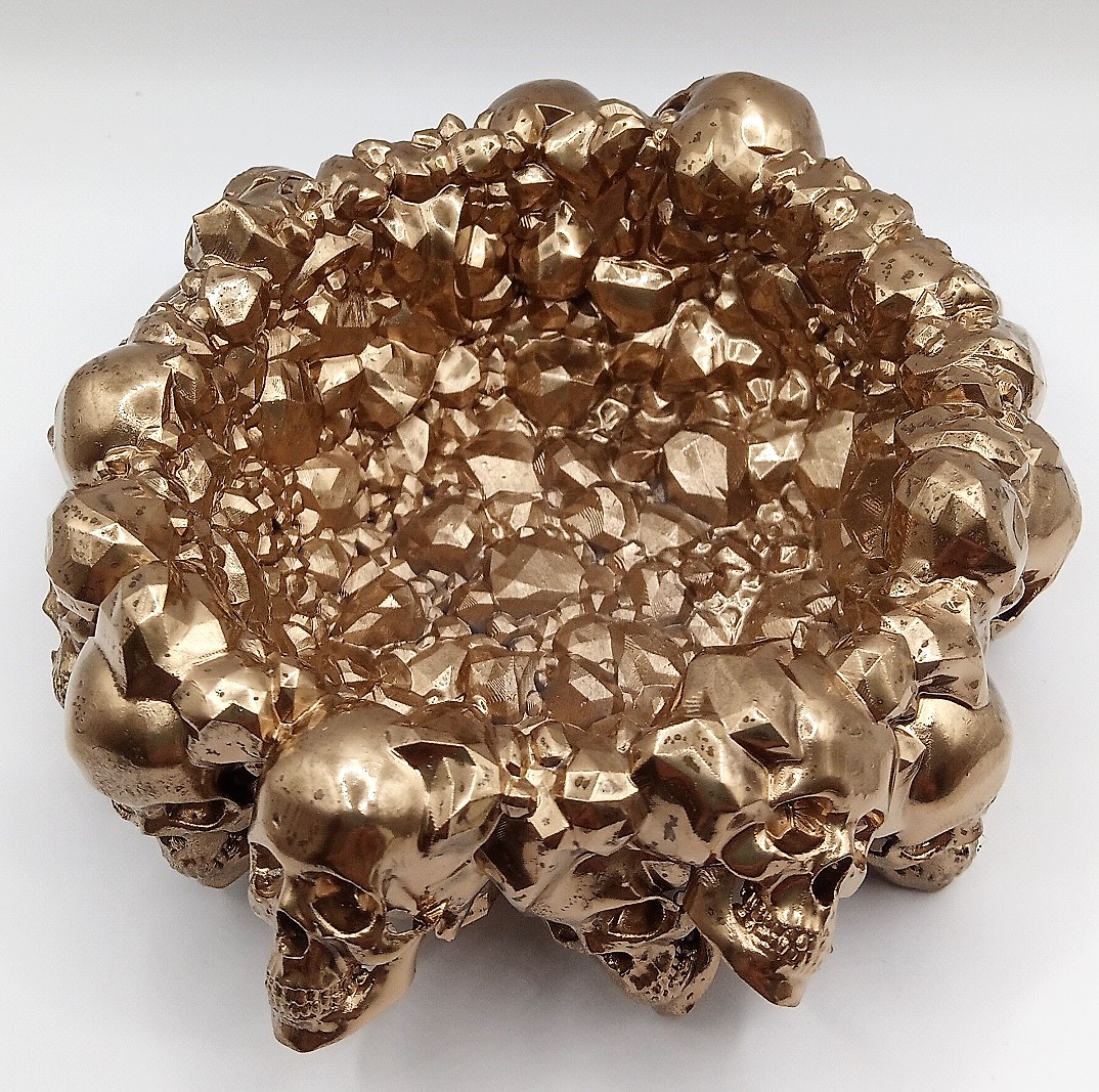 Rocky bowl with skulls