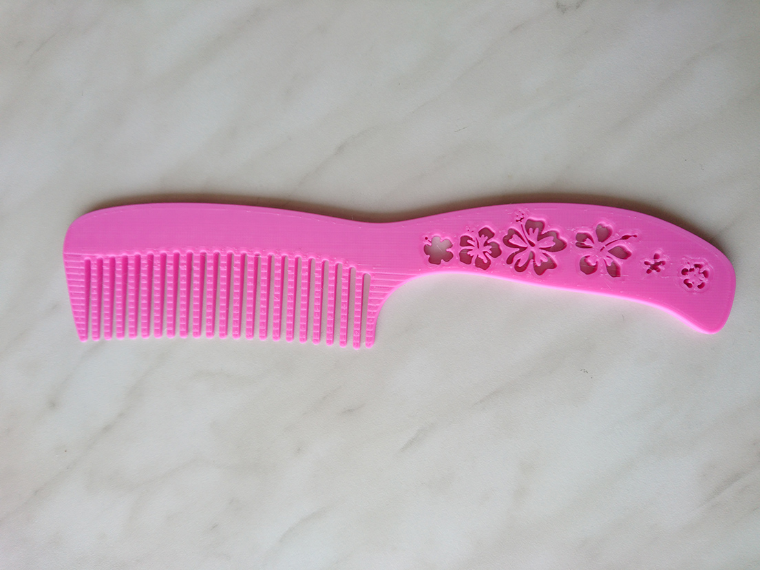 Hair comb with flowers