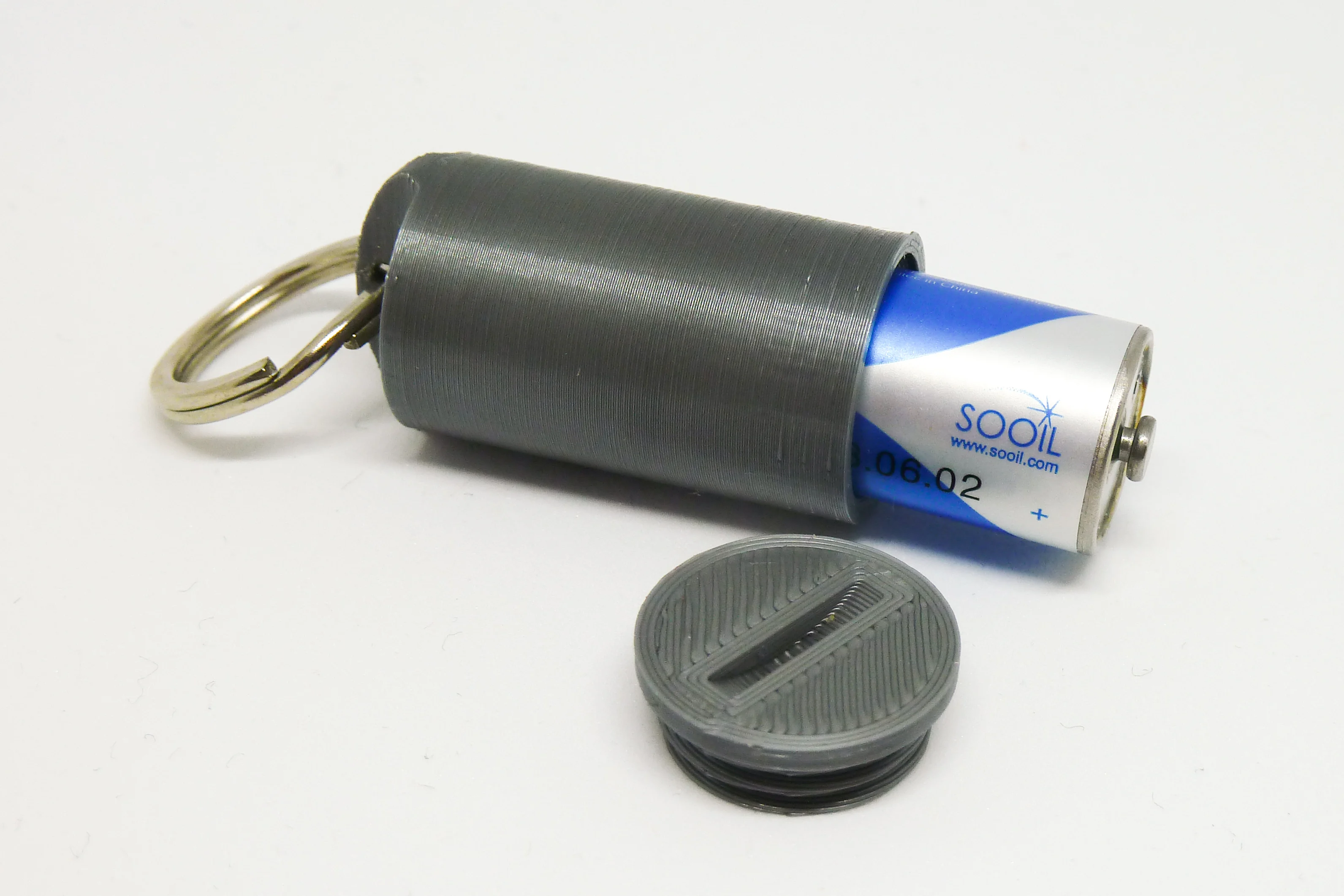 Keychain battery container for Dana R/RS batteries