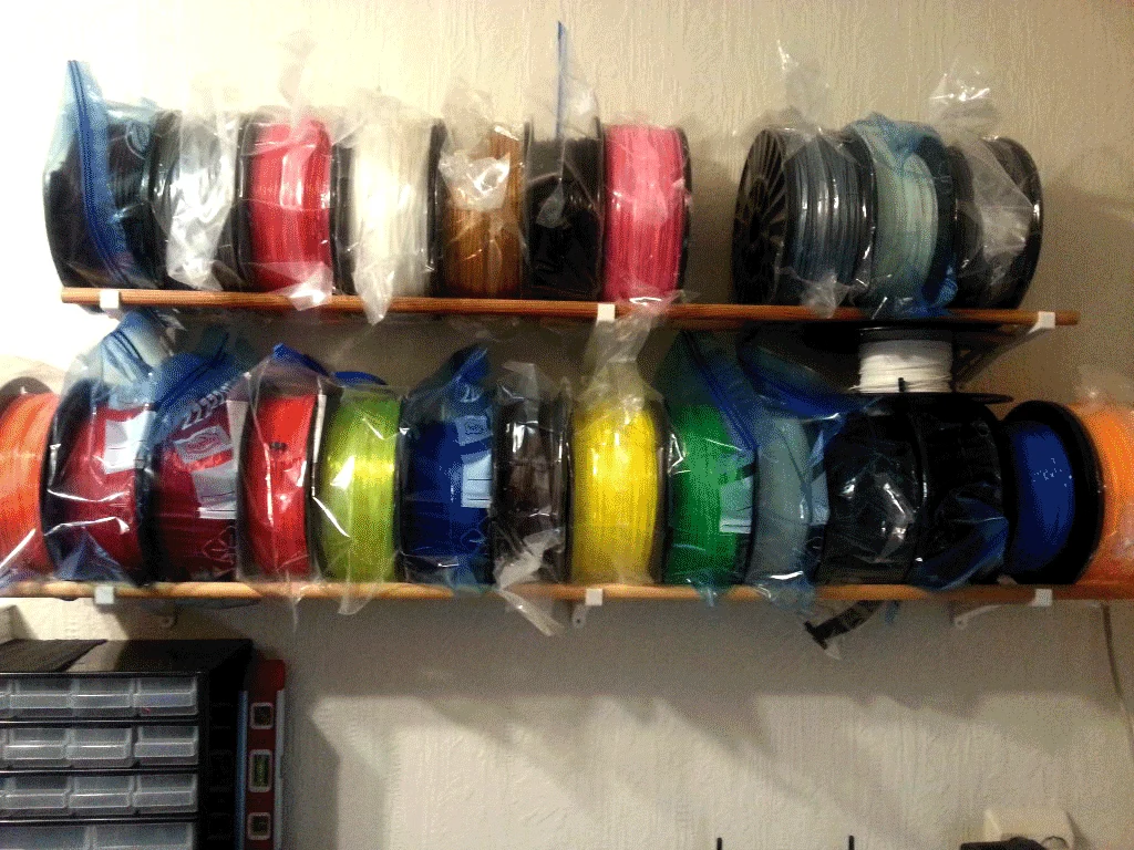 Filament roll shelf brackets