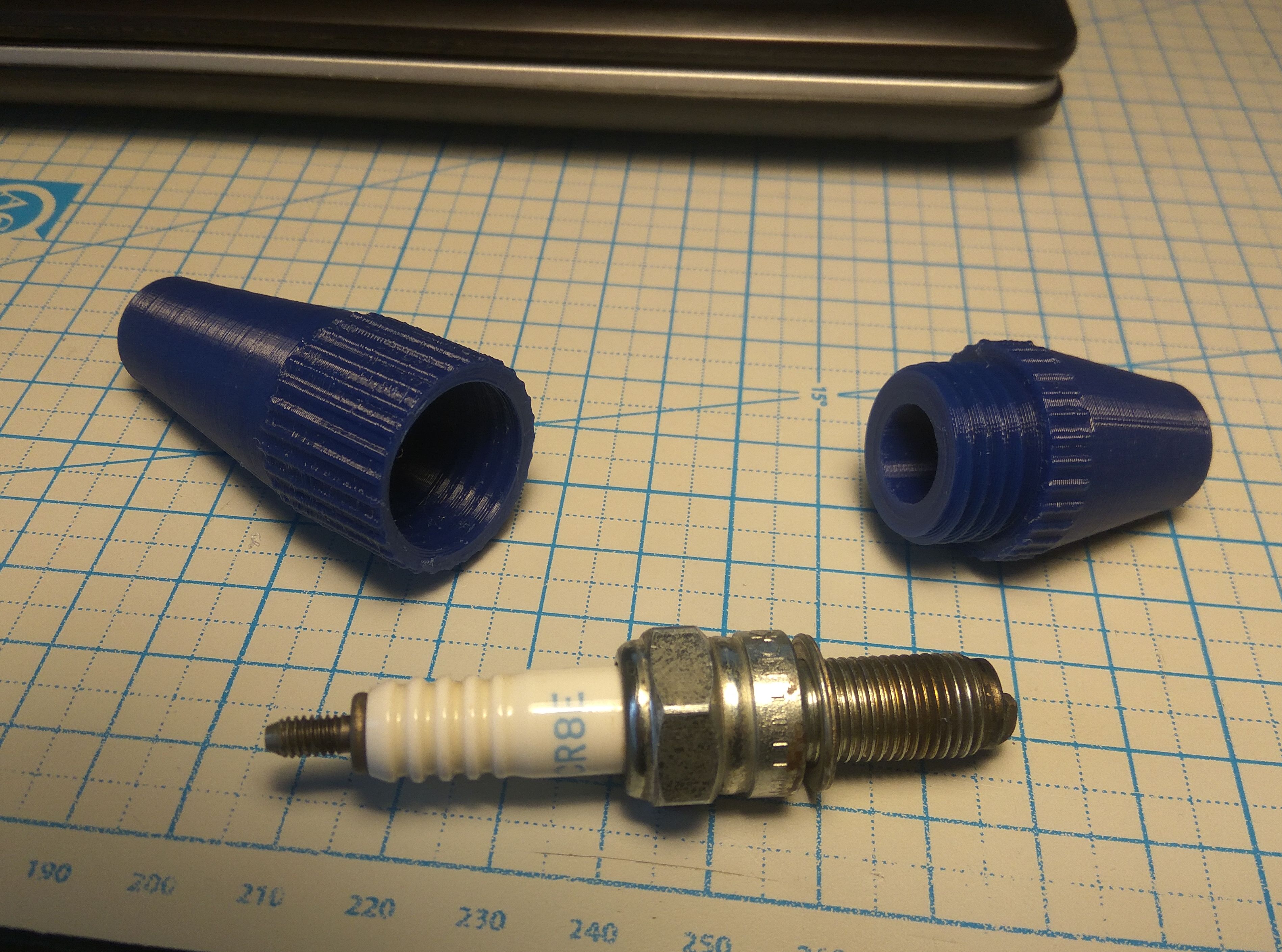 Spark plug case for NGK CR8E