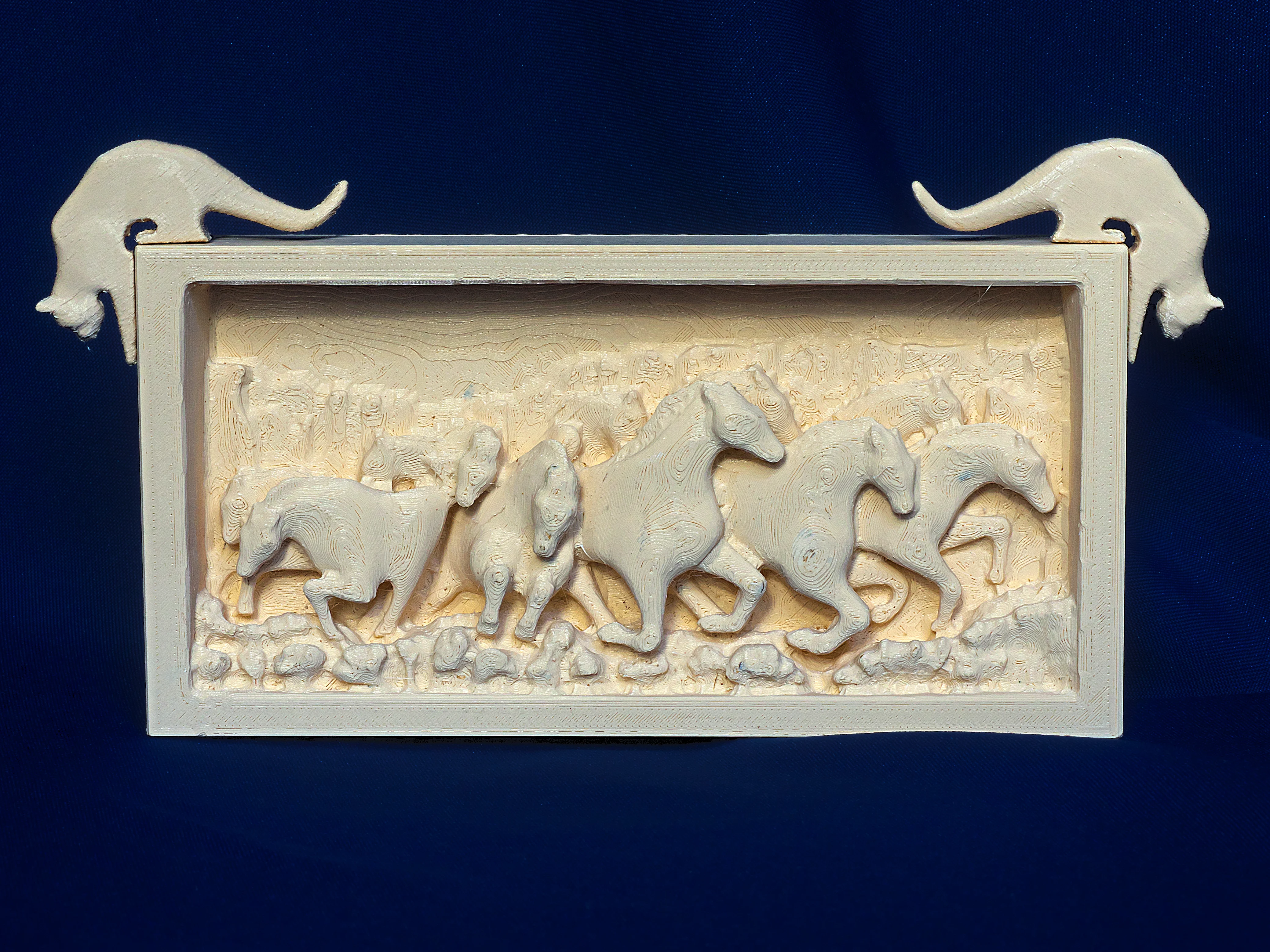 Jean Gordon's carvings The Stampede and Corner Cats