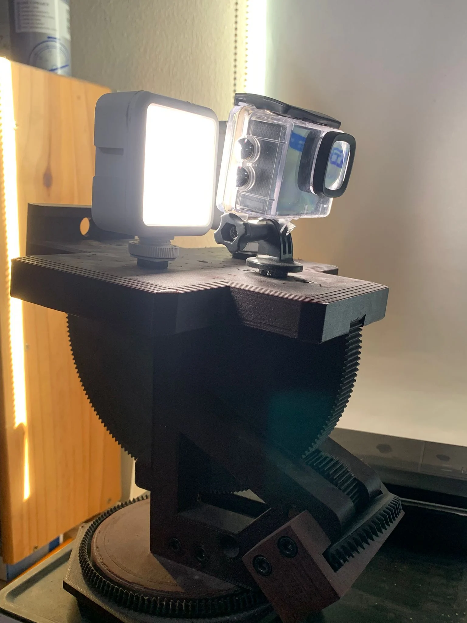 pan and tilt geared holder for lighting, camera , phone and tablet use