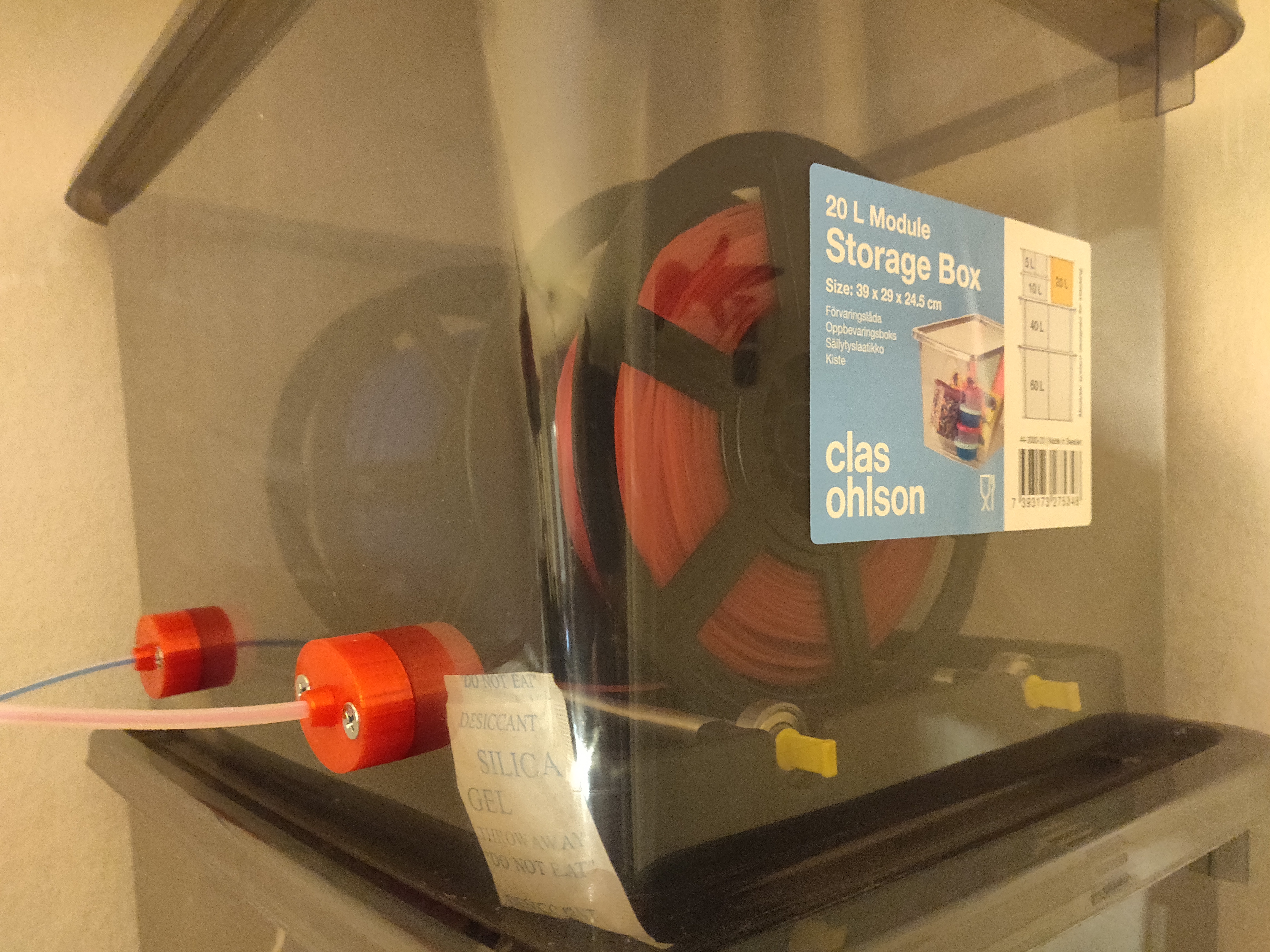 Filament box pass through to PFTE tube