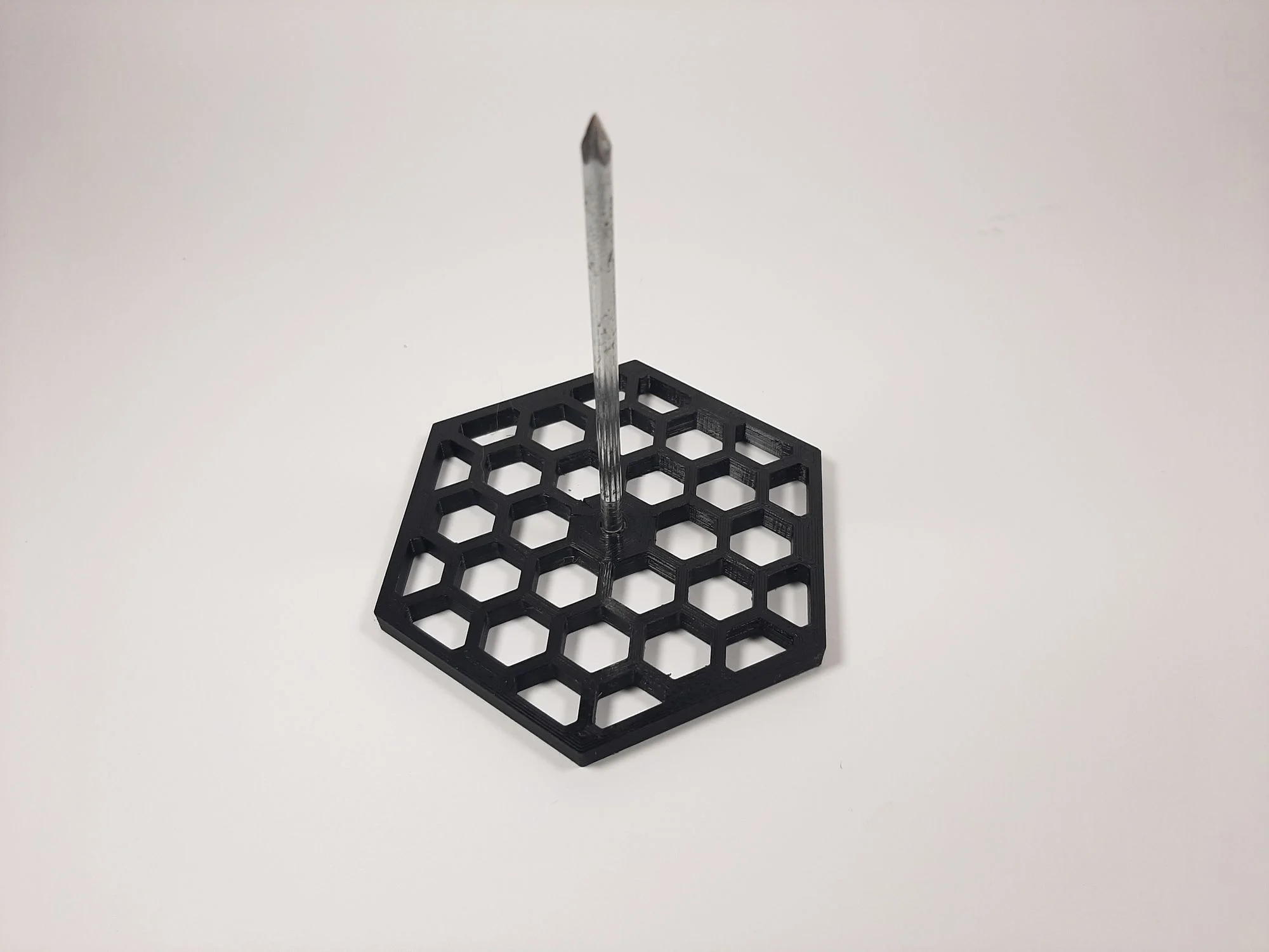 Receipt Punch Base With Hexagonal Pattern