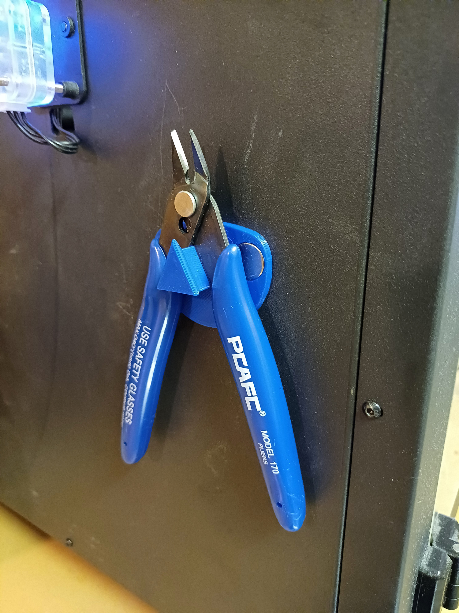 Magnetic hook for pliers