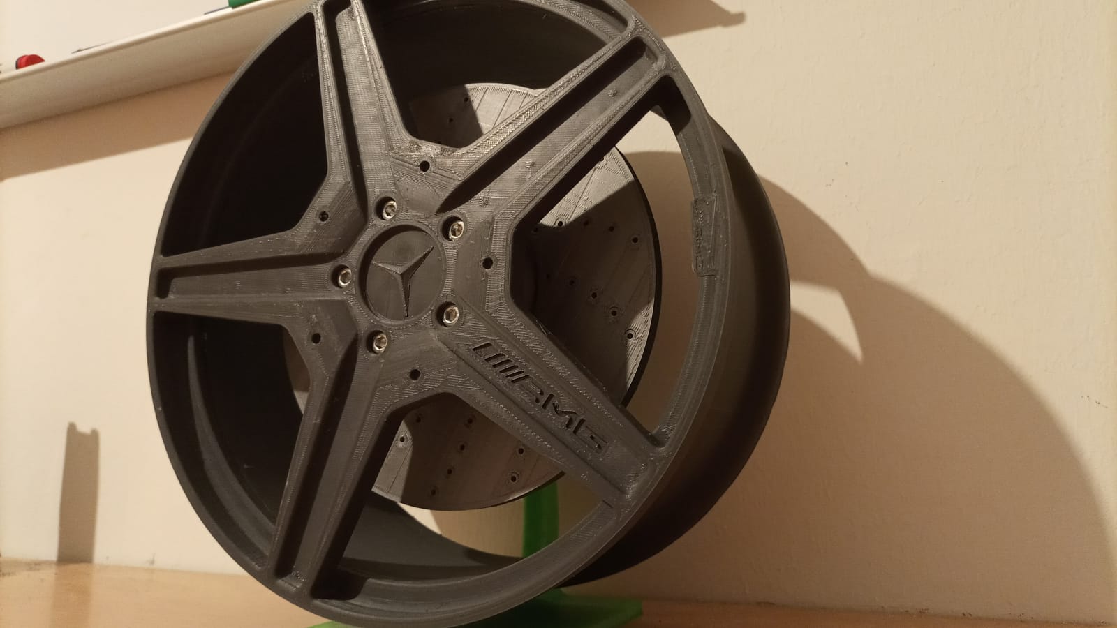 Rim with brake disk and base