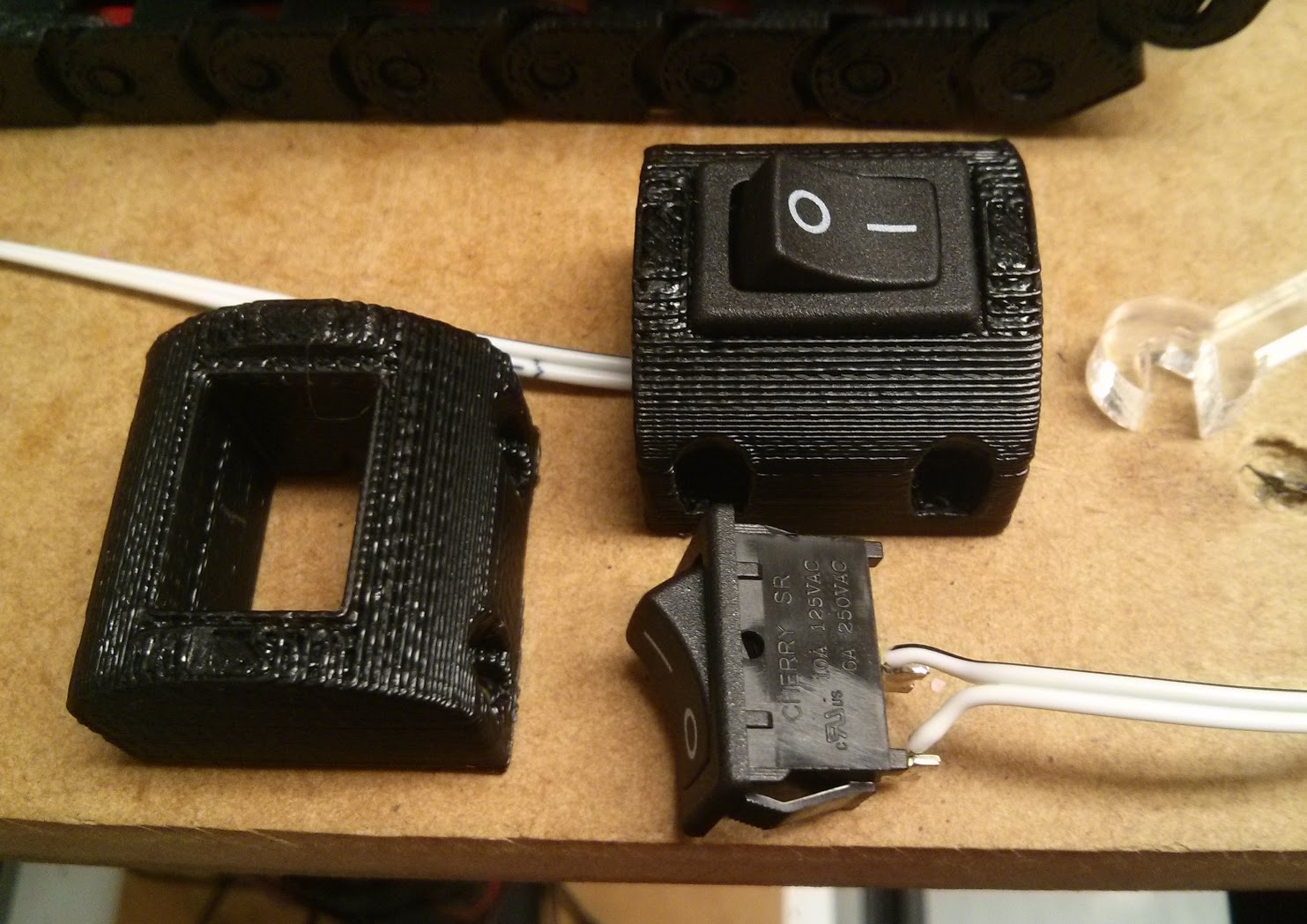 Surface mounted on/off switch holder