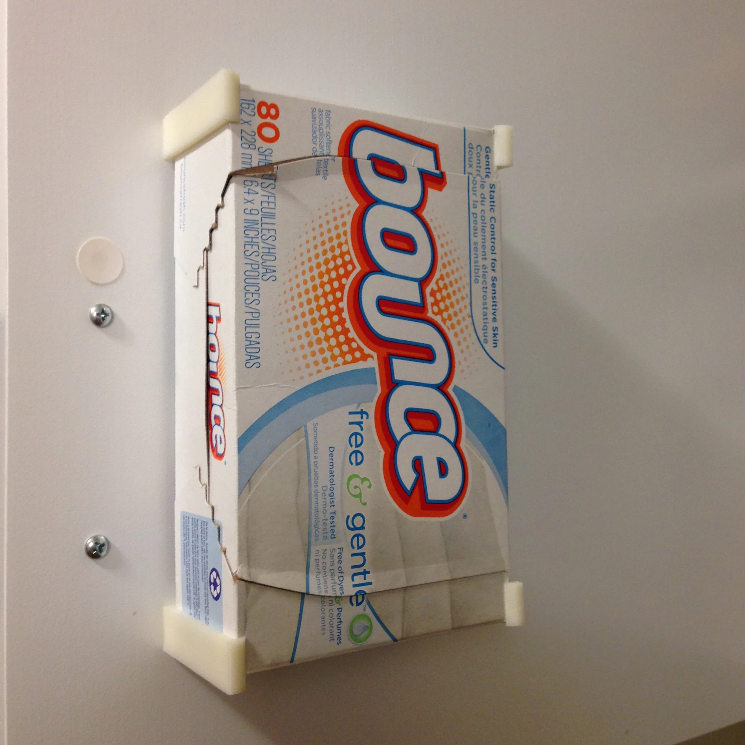 Wall mounted dryer sheet holder