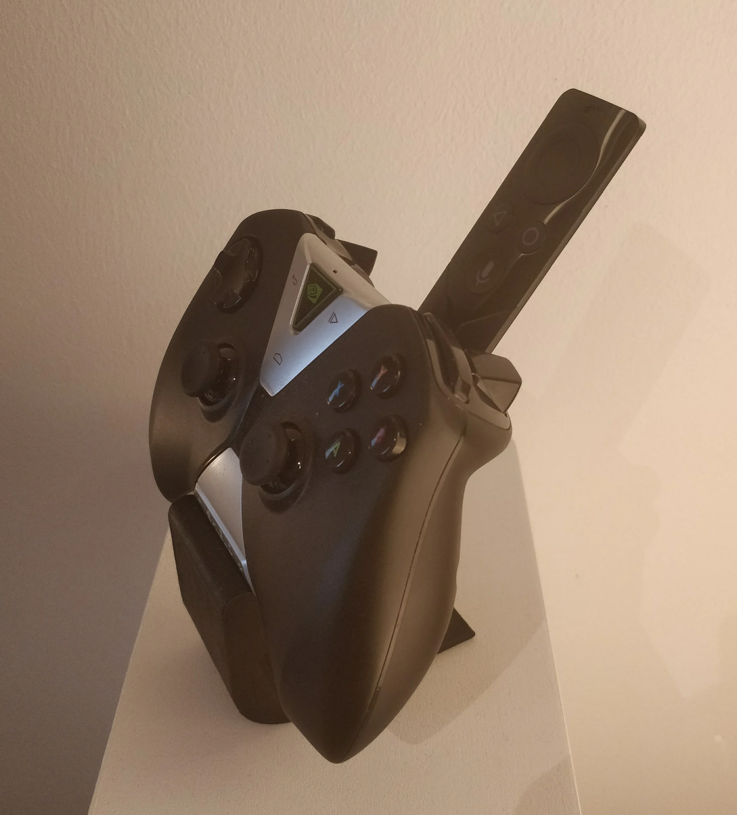 Nvidia Shield Controller (2016) + Remote Stand. Steam Controller fits pefectly