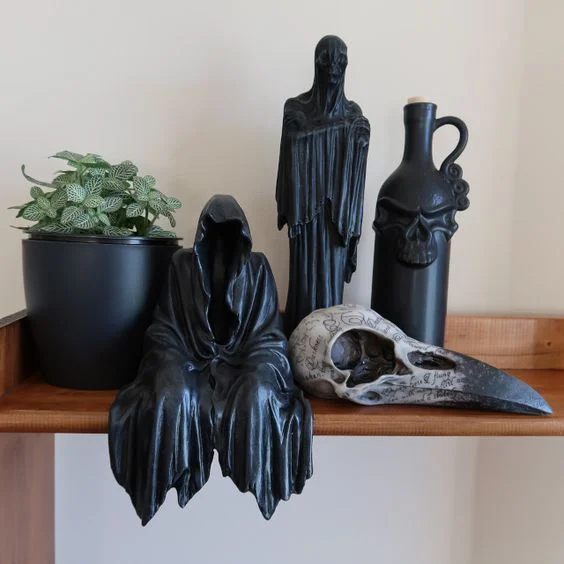 A STATUE OF A SITTING GHOST