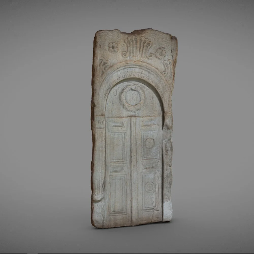 Funerary stele decorated with a crown