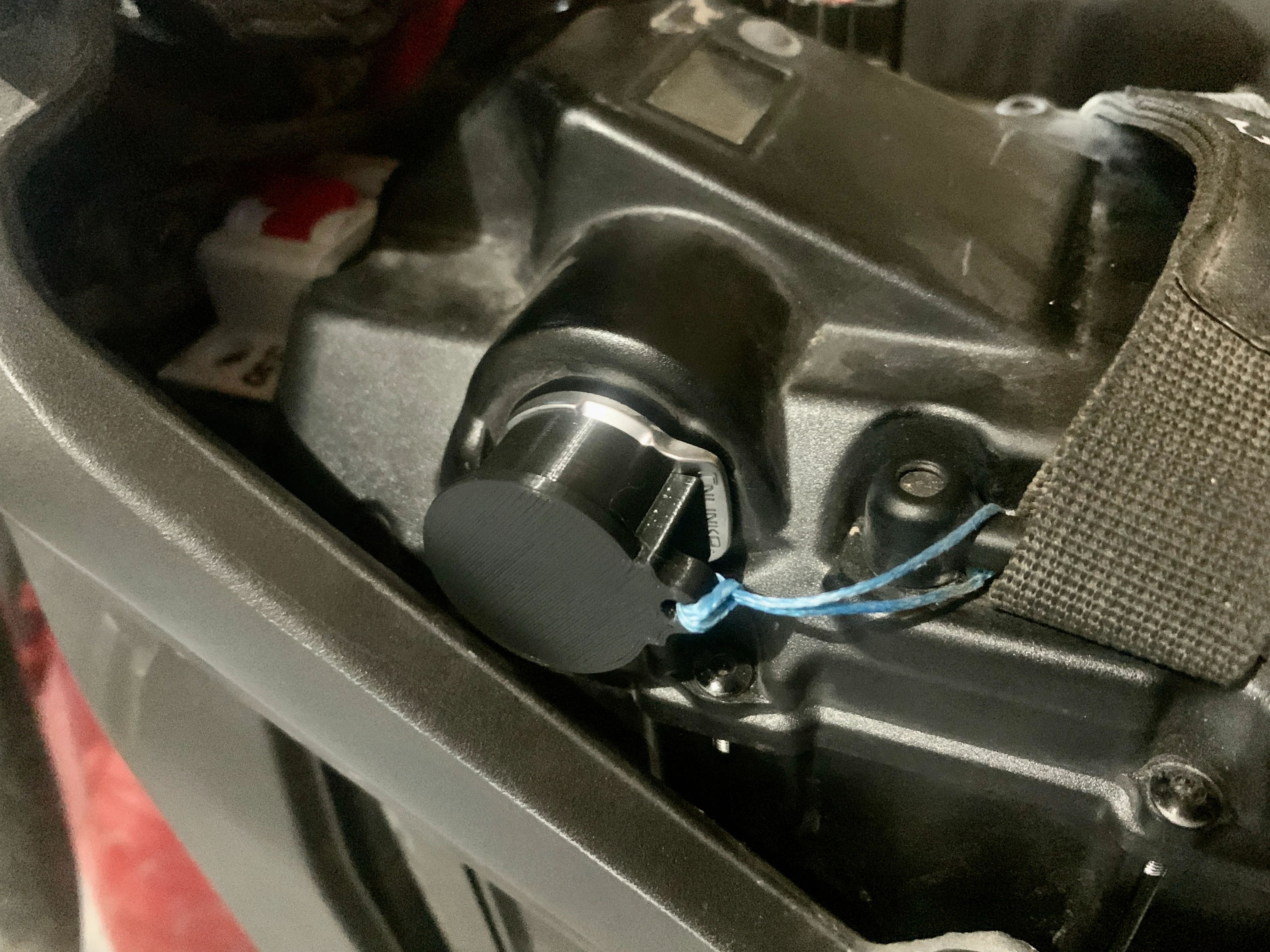 Sur-Ron Battery Charge Port Cap with tether point