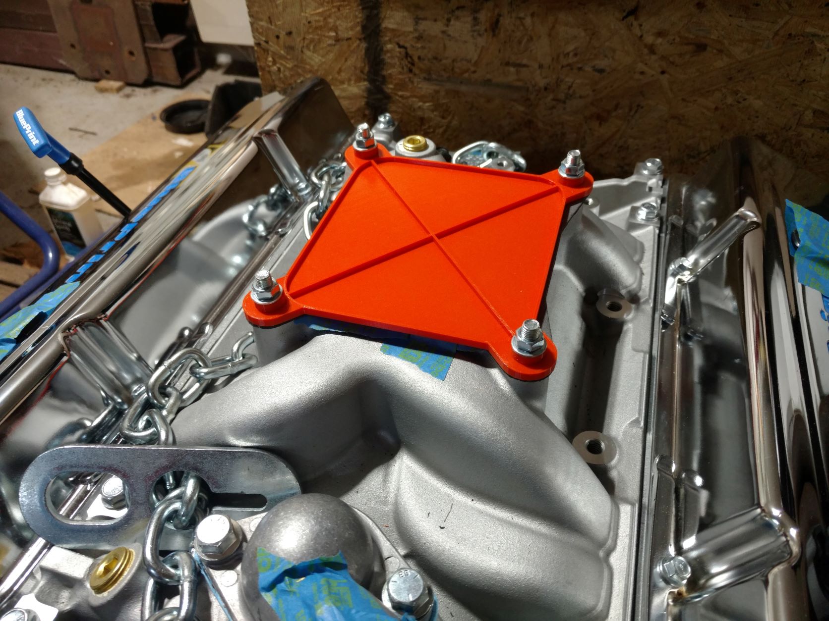 Intake / carburetor manifold cover.
