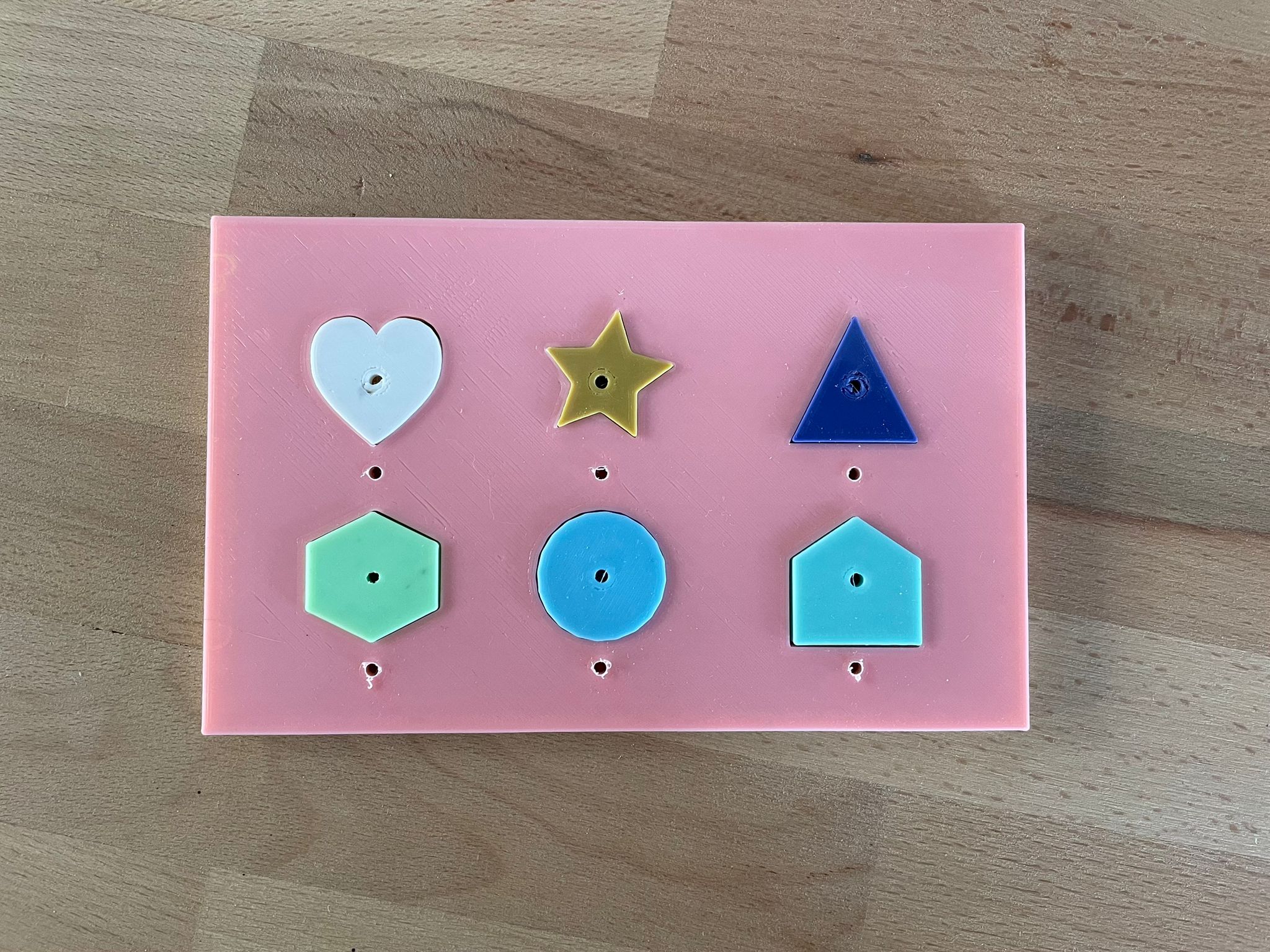 Forms board with string for babies