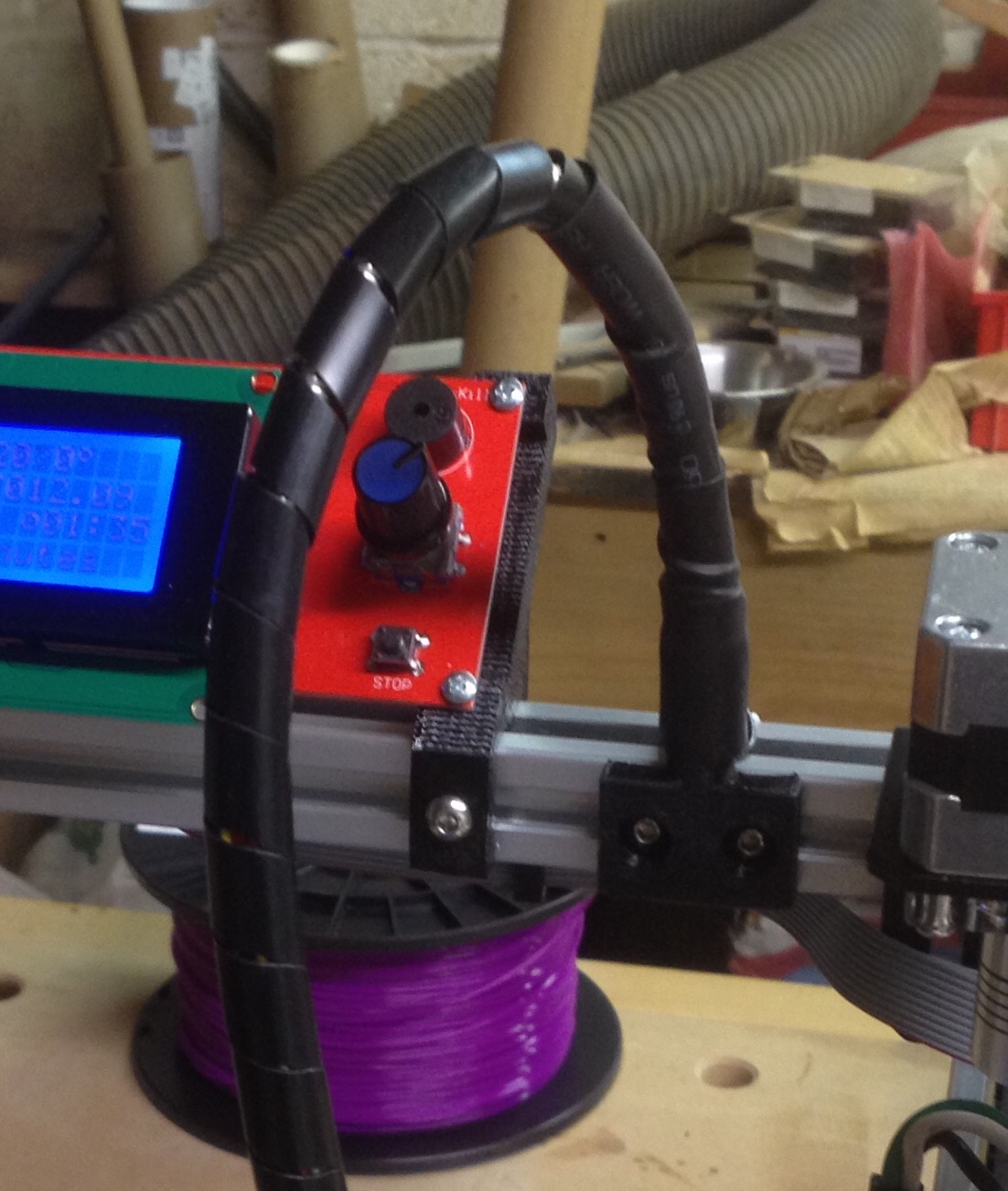 Printhead wiring harness mount for a Folger RepRap 2020 Prusa i3