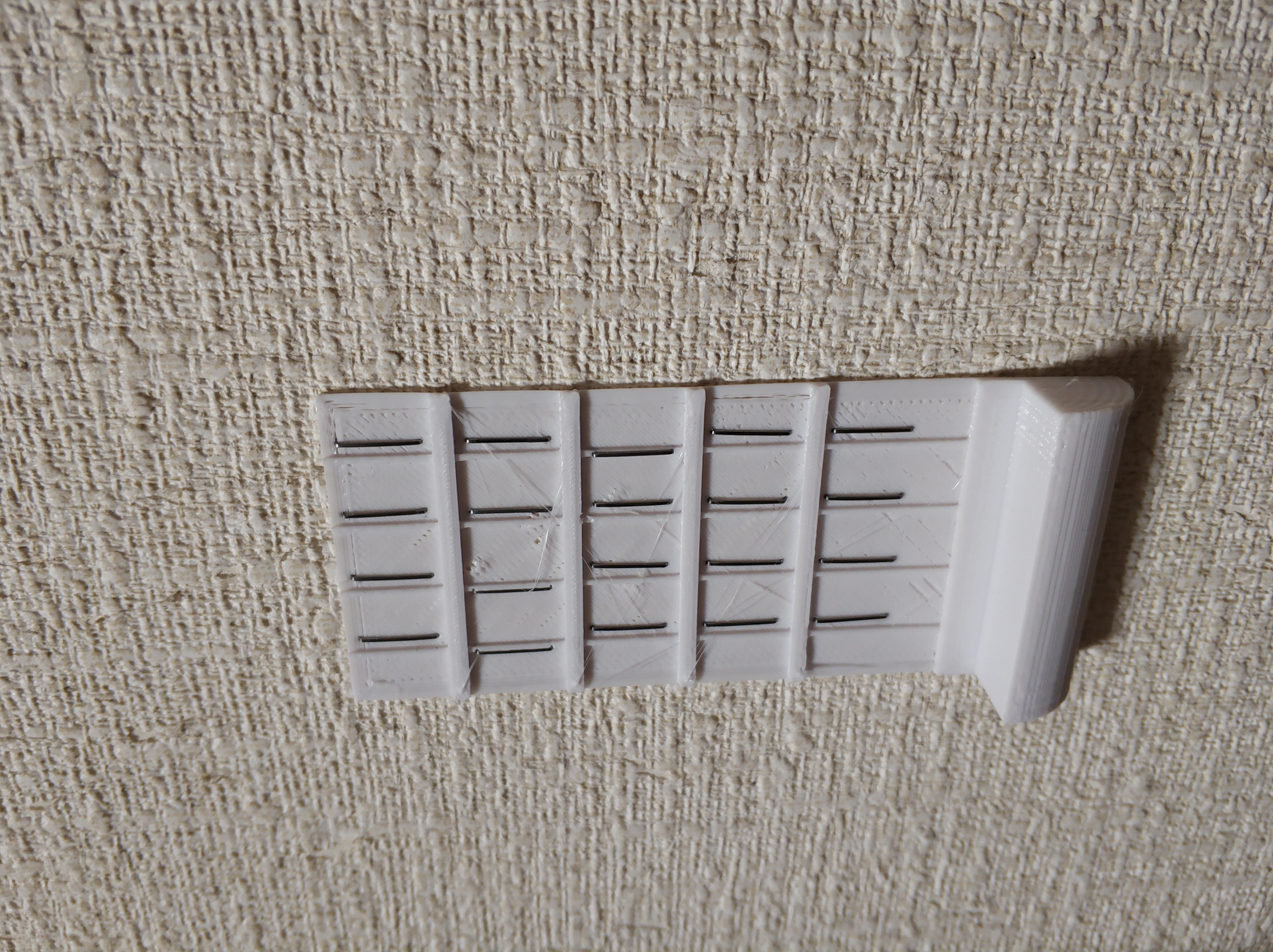 Staple-able wall hook v1