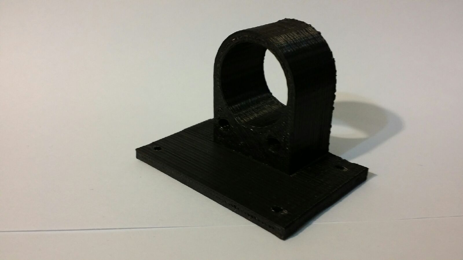 Wall Mountable Die Holder (Or anything that needs a 25mm hole)